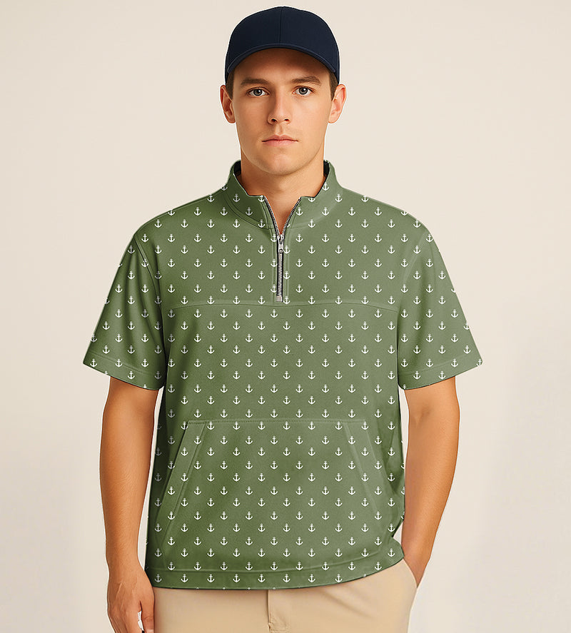 Olive green half zipper turtleneck golf shirt with white anchor embroidery and short sleeves worn by man