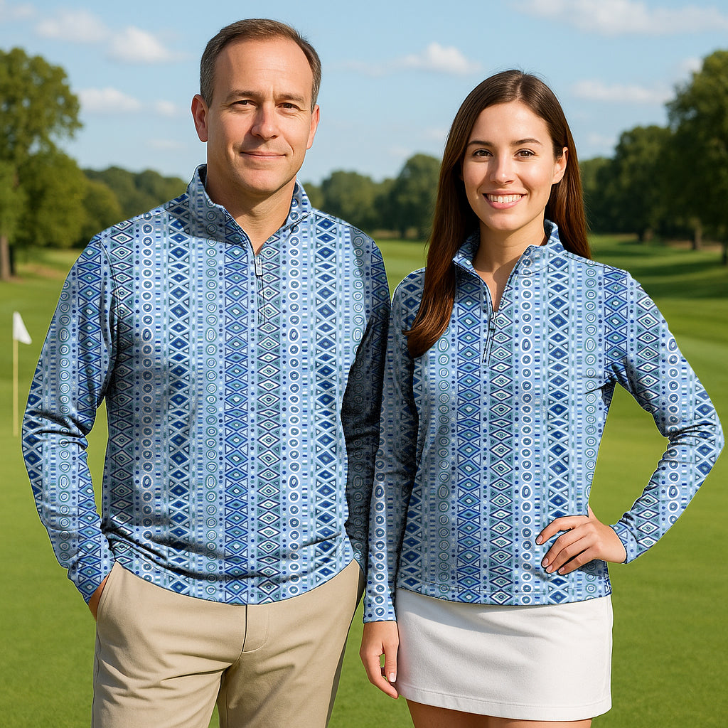 Couple wearing Geometric Triba Couple Golf 3/4 zip tops with long sleeves on golf course