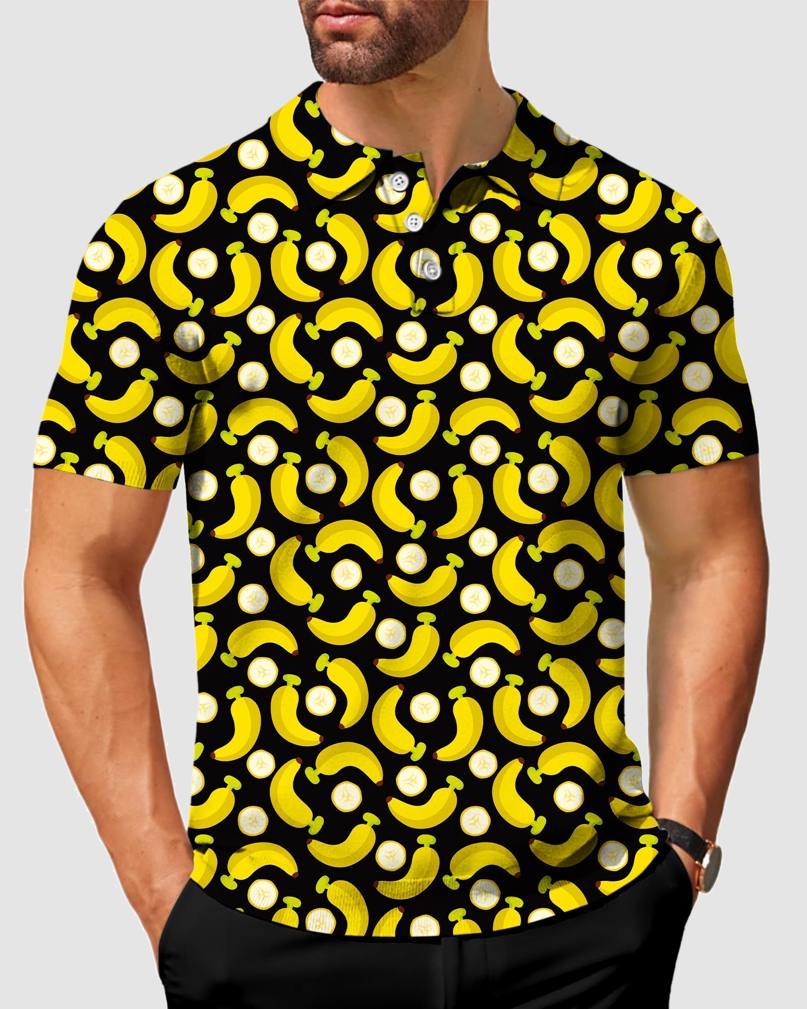 Men's Halloween Bananas polo shirt with yellow banana and peel pattern on black, moisture-wicking, four-way stretch, UPF 40+ fabric, wrinkle resistant and classic fit