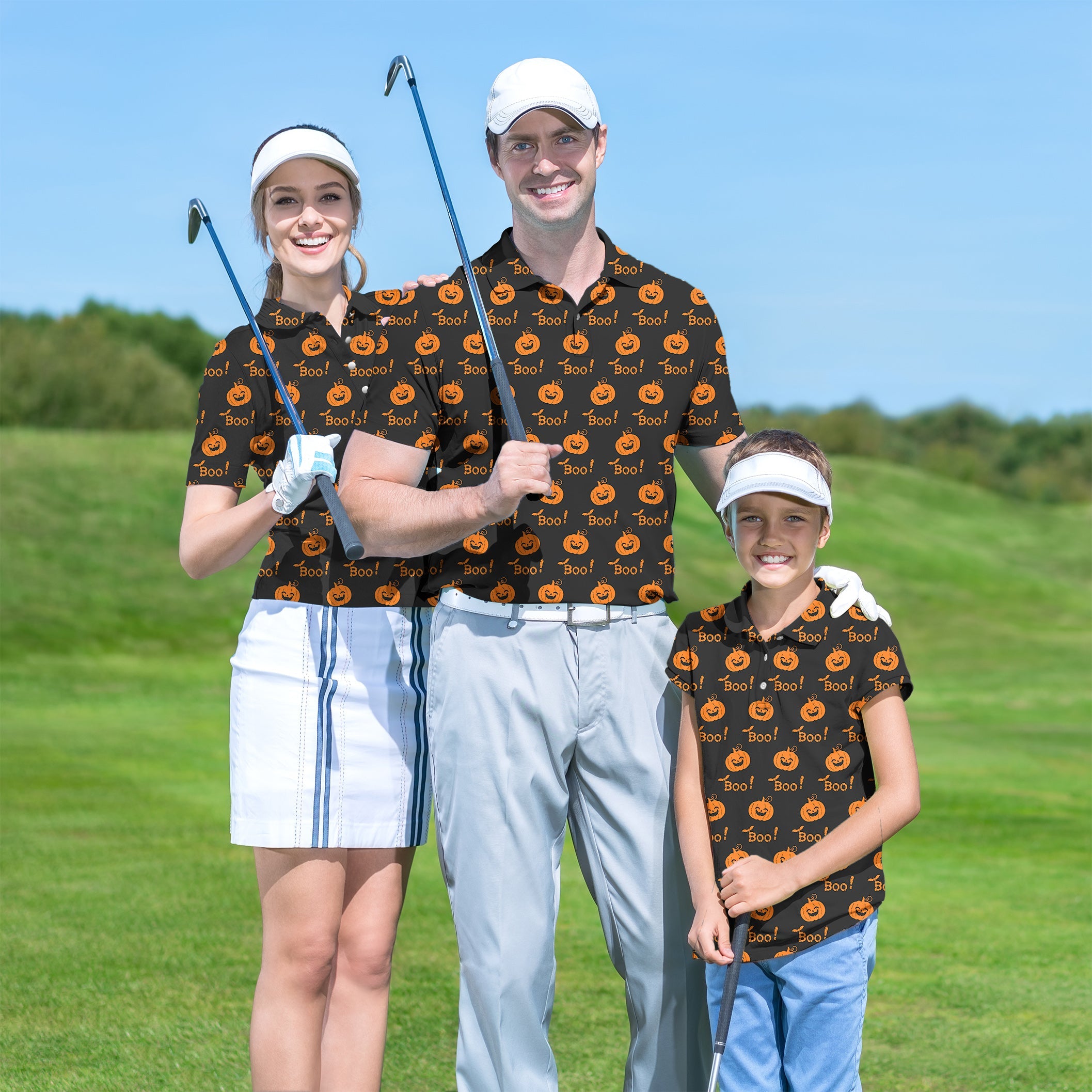 Family wearing matching Halloween Boo pumpkin golf shirts on course