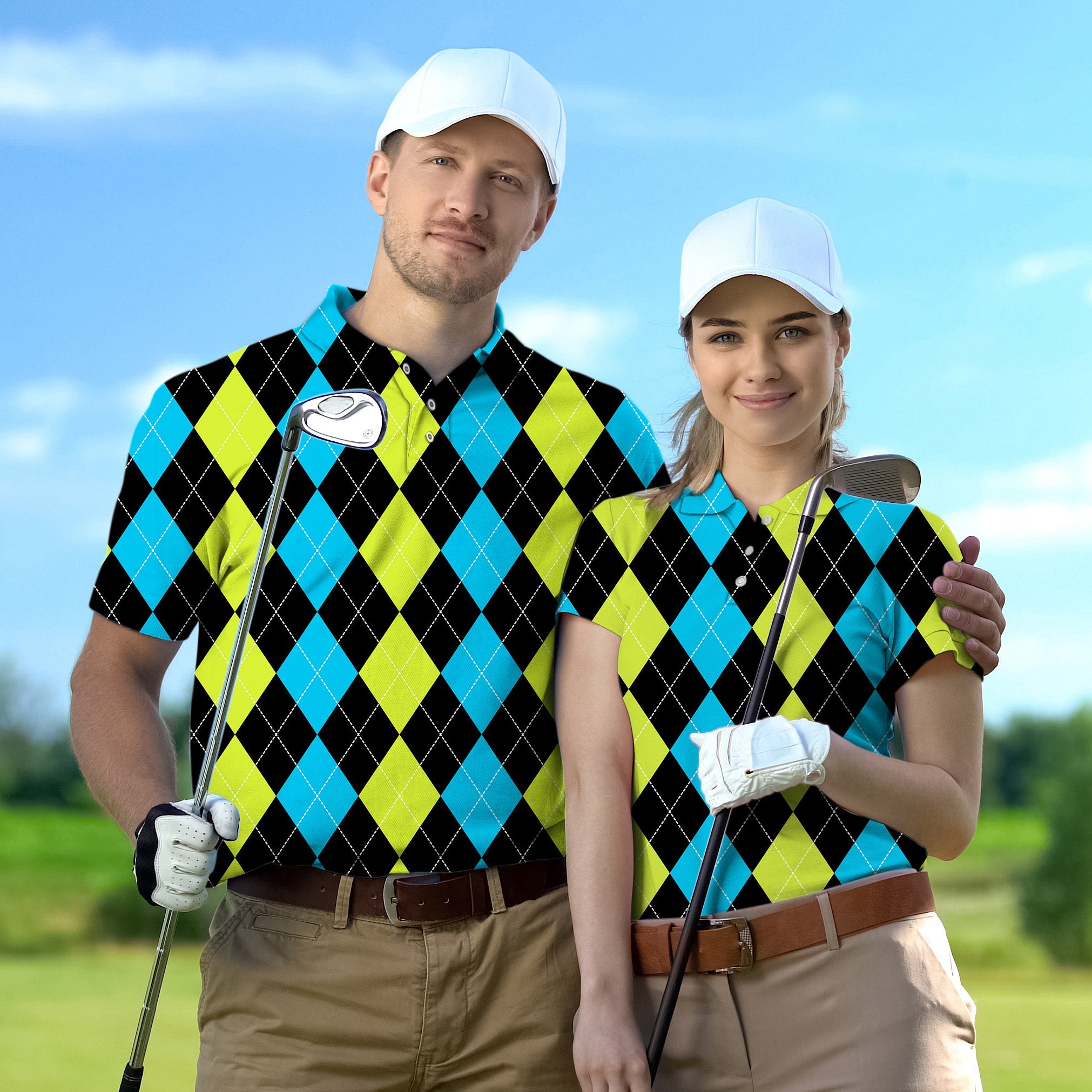 Couple wearing matching Halloween black green blue argyle golf shirts with caps on golf course
