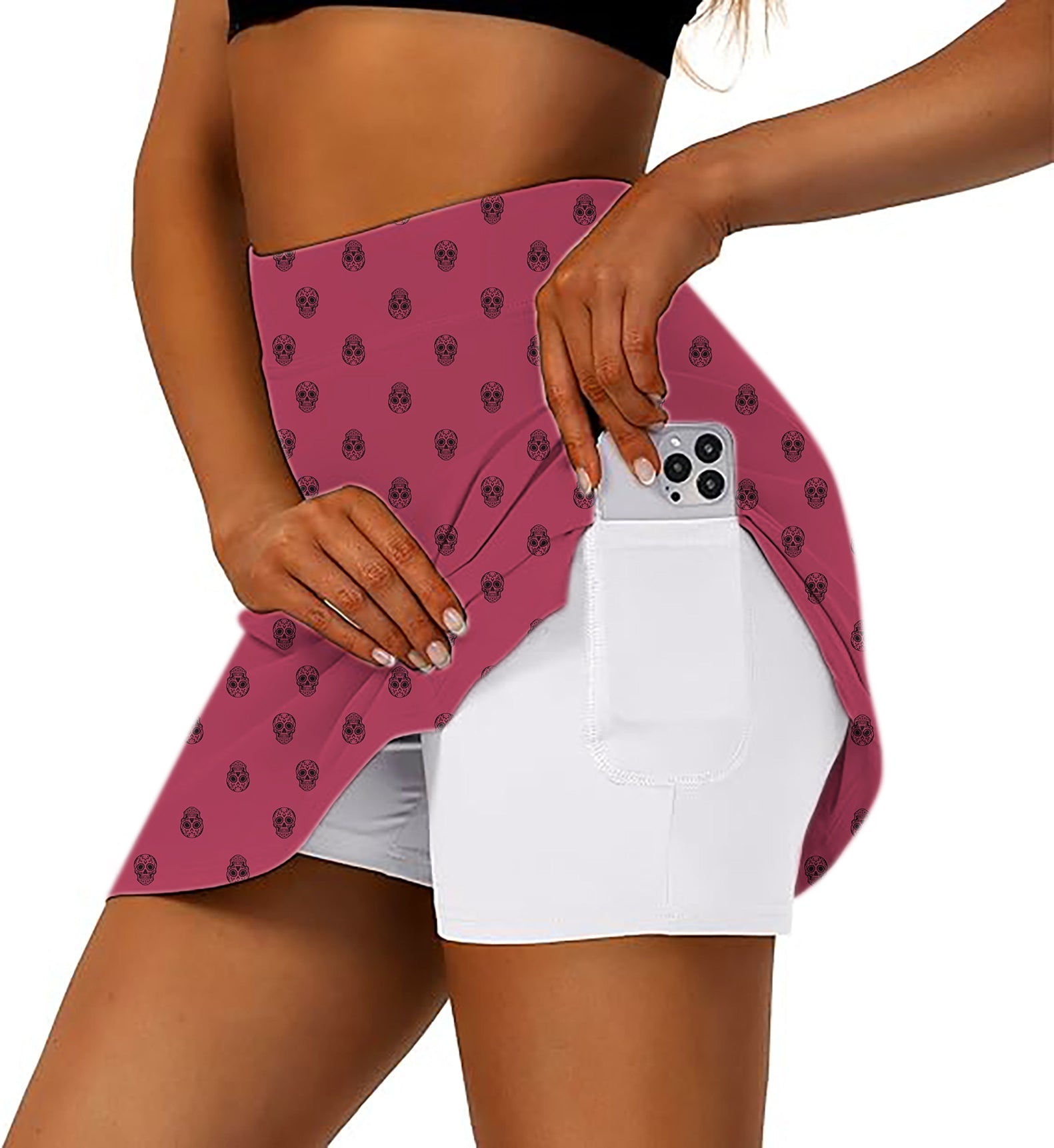 Women's skull custom background pink athletic golf skort with phone pocket and flared design