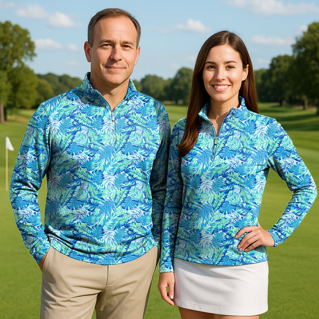 Couple wearing palm leaves print golf active 3/4 zip tops with long sleeves on a golf course