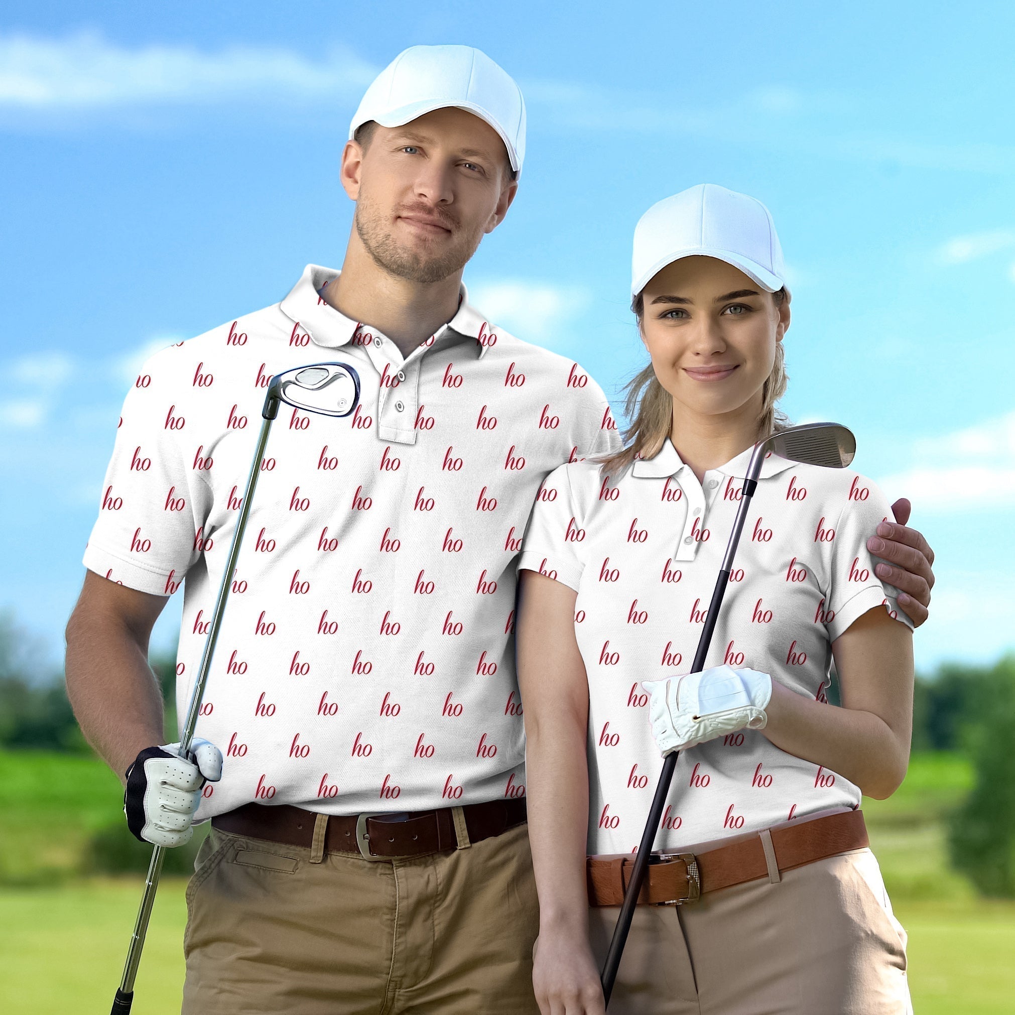Couple wearing white custom name golf shirts with red "ho" pattern holding golf clubs on course