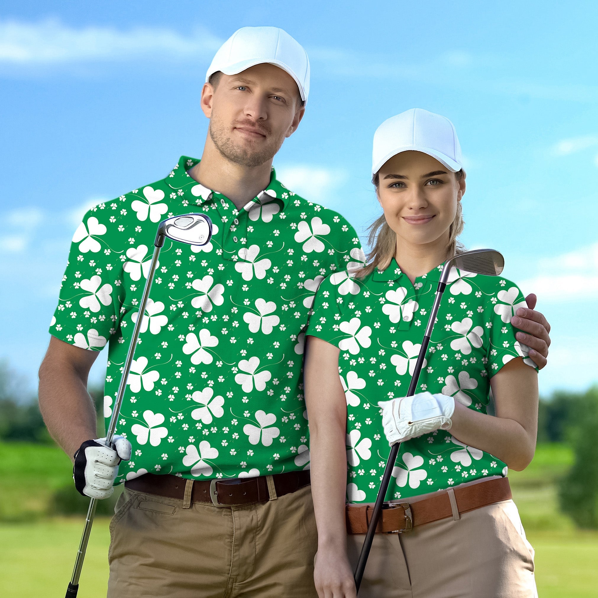 Couple wearing green leaf clover St. Patrick's Day golf shirts holding clubs outdoors