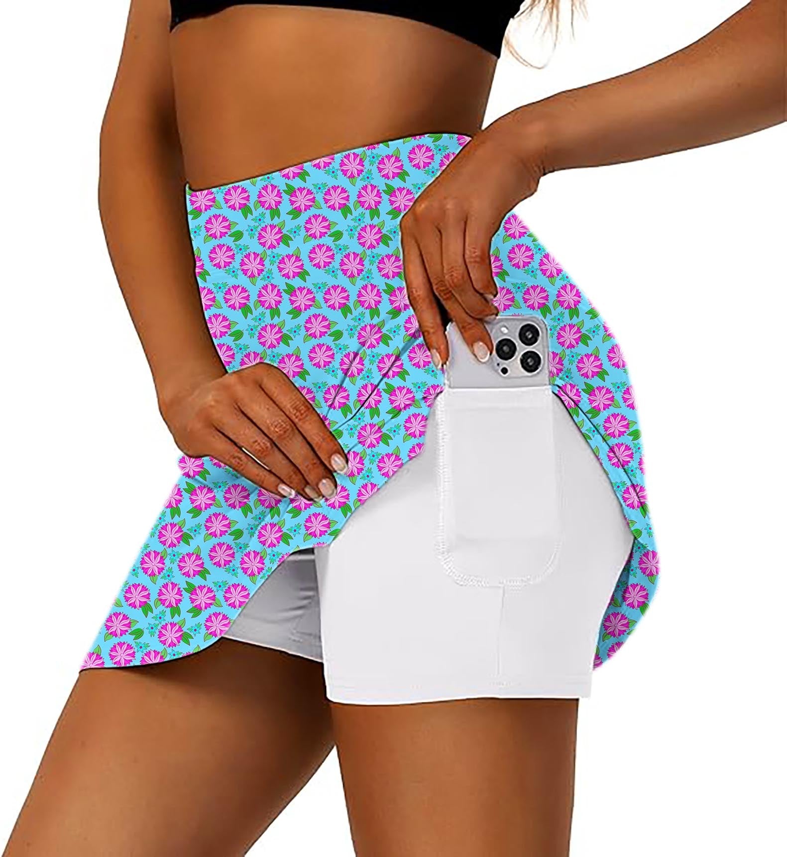 Women's flower golf skirt with inner shorts and side pocket holding a phone