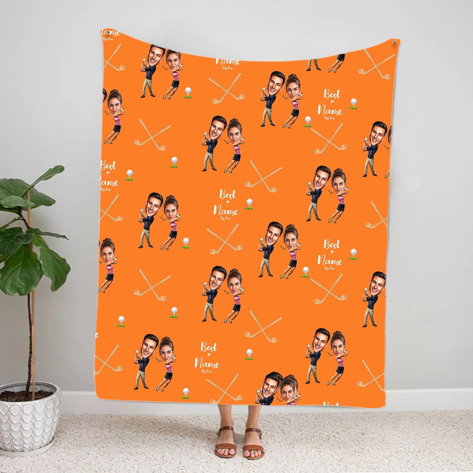 Custom couple photo golf fleece blanket with caricature faces and names on orange background