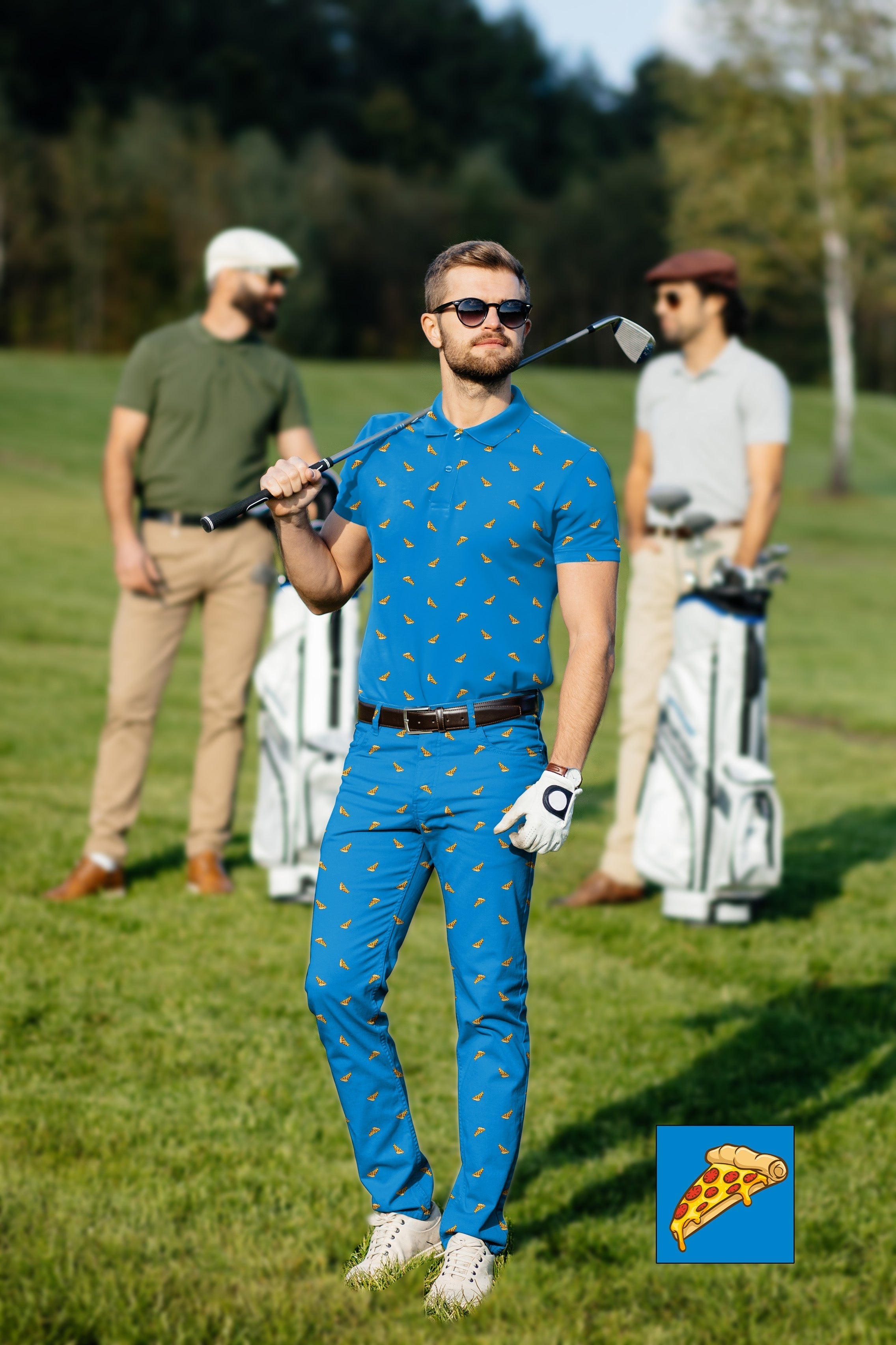 Men's golf set with blue polo and pants featuring pizza print on golf course