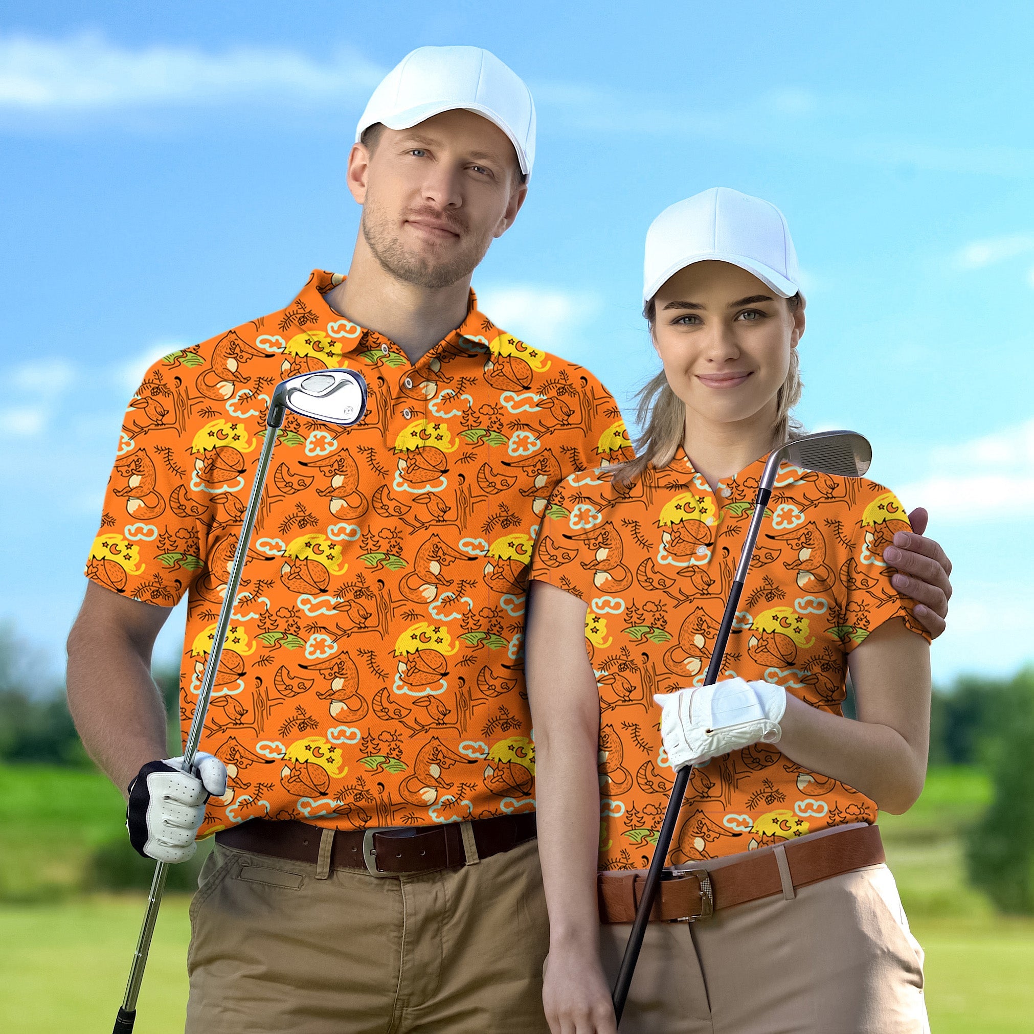 Couple wearing orange lazy fox print golf shirts at championship tournament with golf clubs outdoors