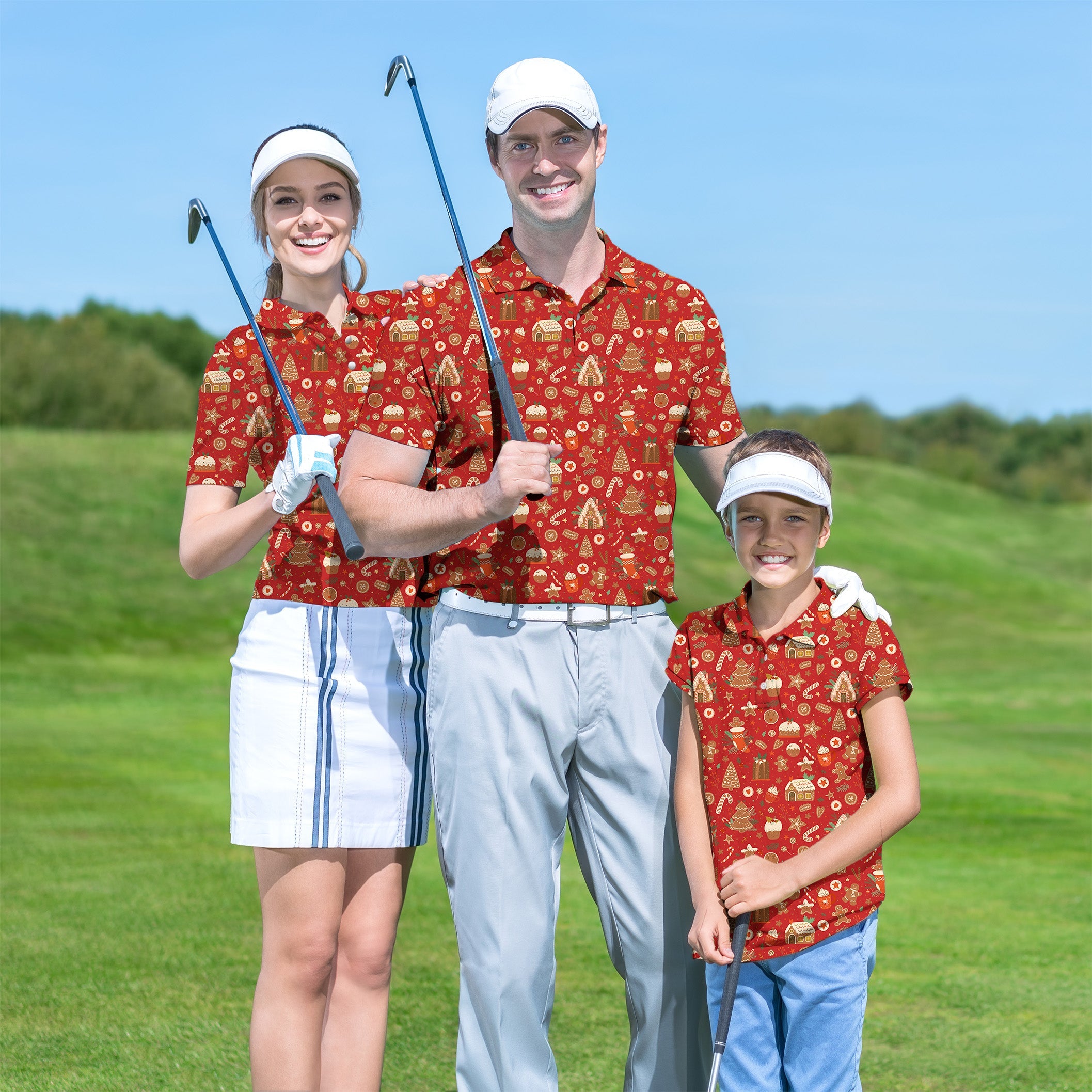 Family wearing red Christmas candy house golf polos on golf course