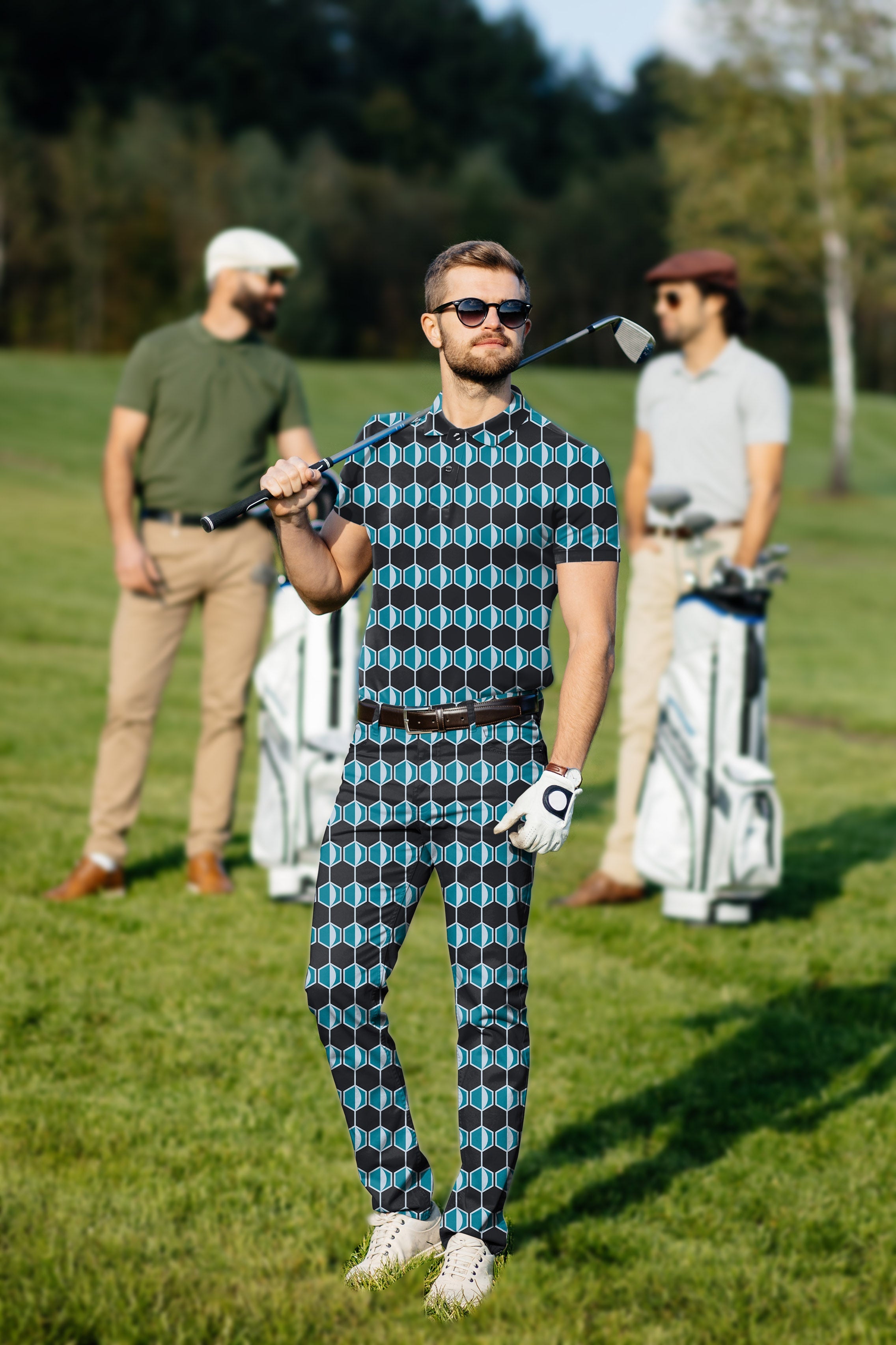 Men's Golf Set navy blue hexagon pattern polo and pants on golfer with sunglasses on course
