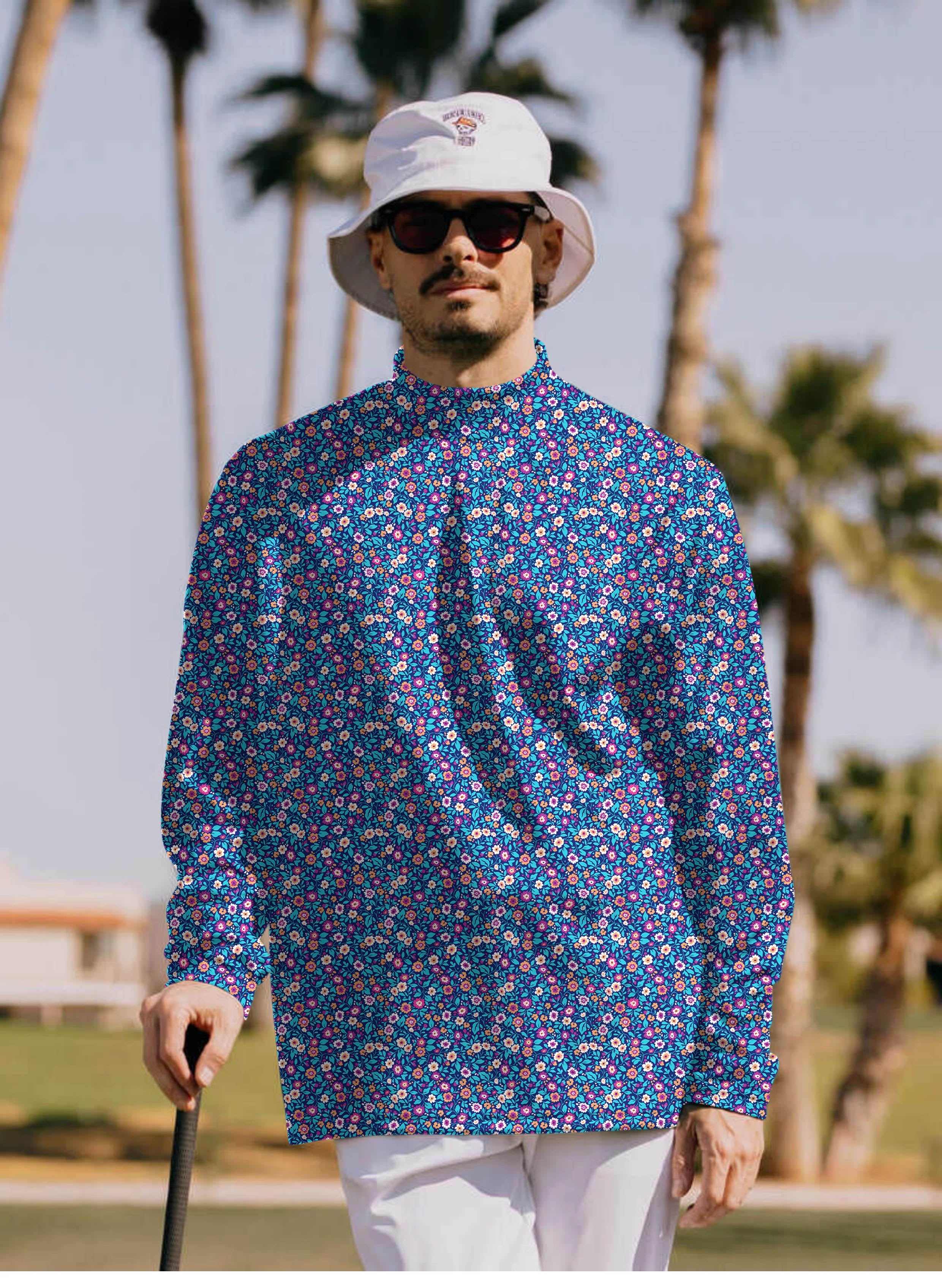 Men's dark floral pullover with high neck and long sleeves worn outdoors