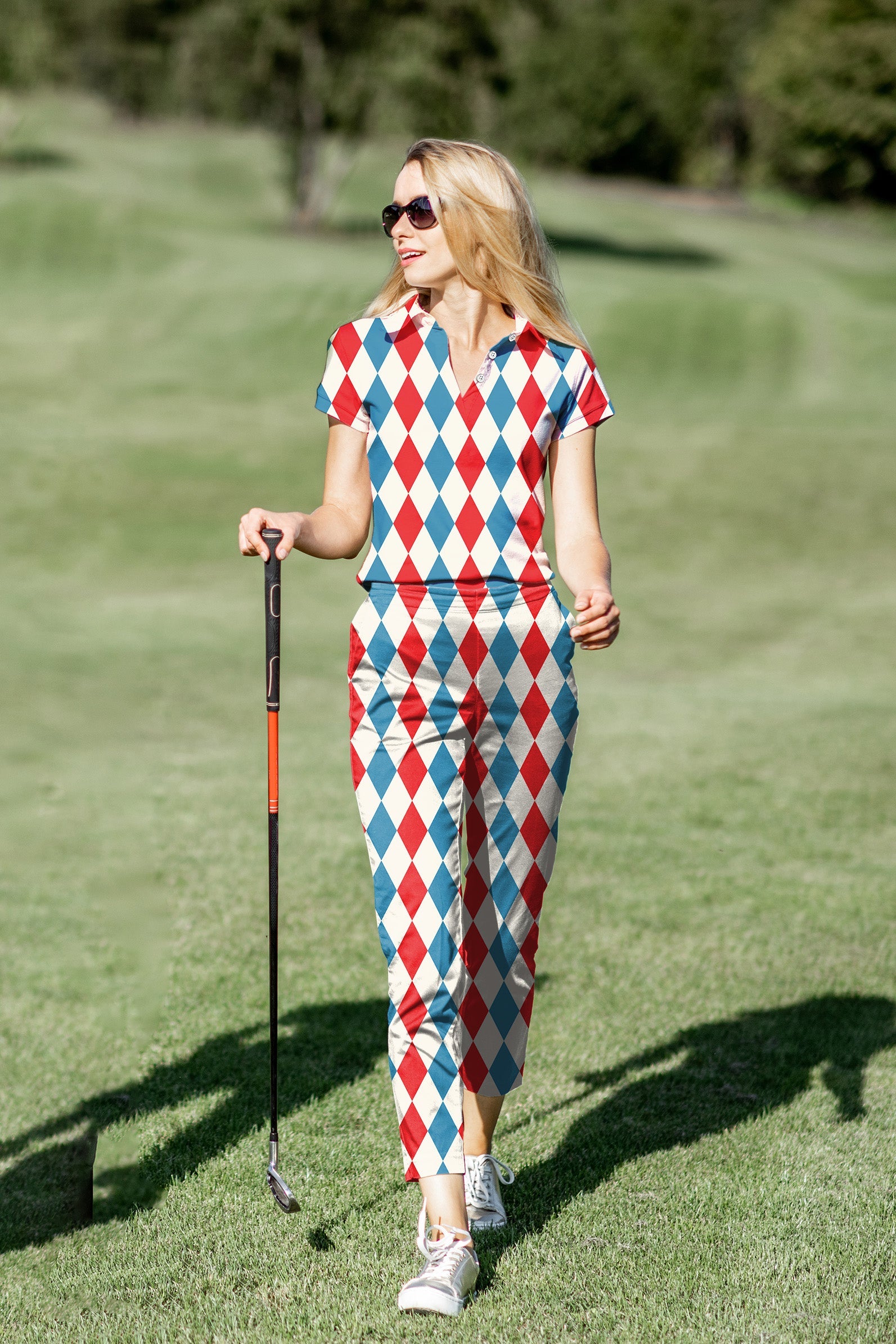Women's golf polo and pants set with geometric checkerboard argyle pattern, breathable and stretch fabric for comfort on the green