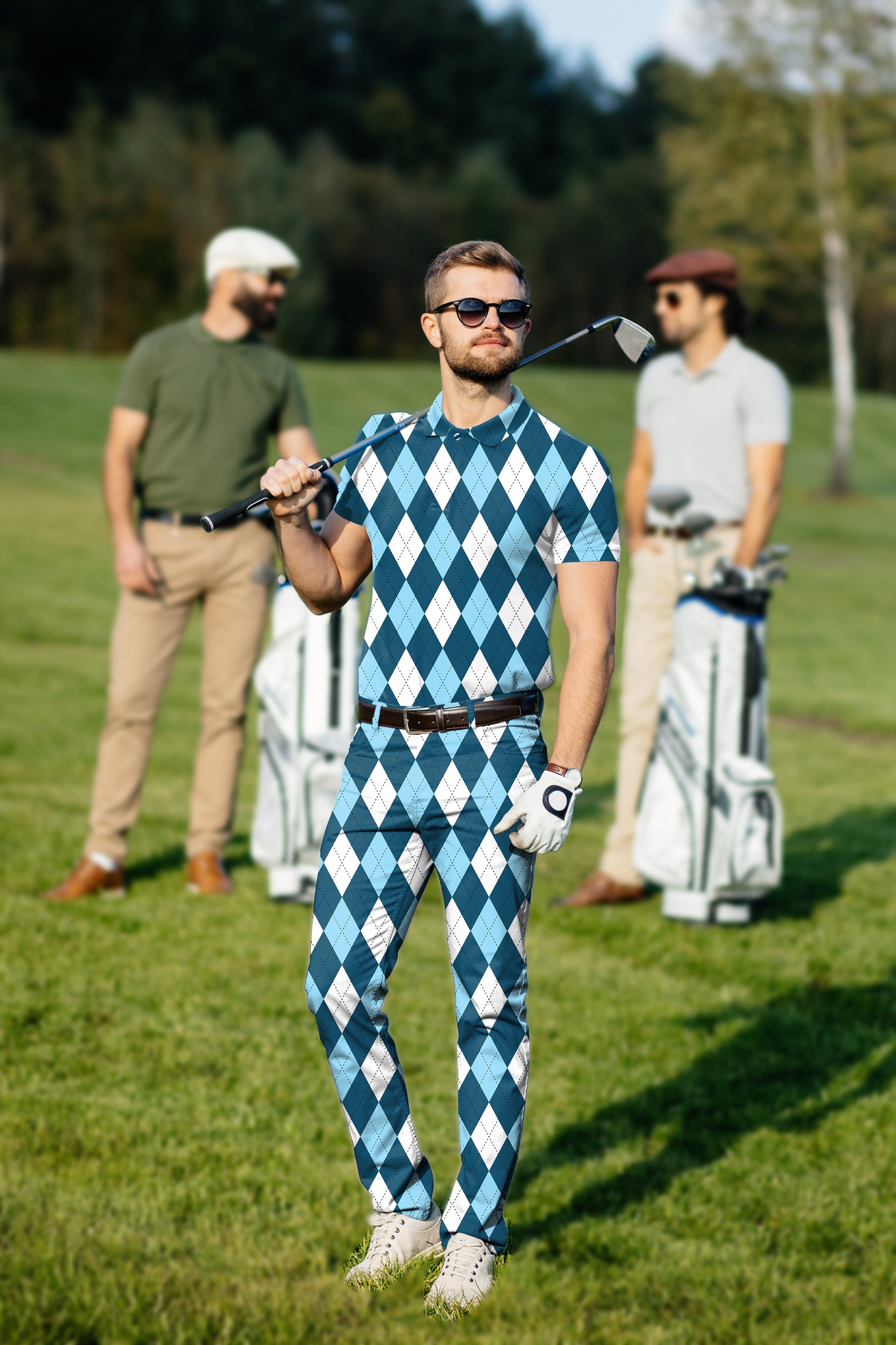 Men's golf set with diamond pattern polo and pants in moderate blue, featuring four-way stretch and moisture-wicking fabric