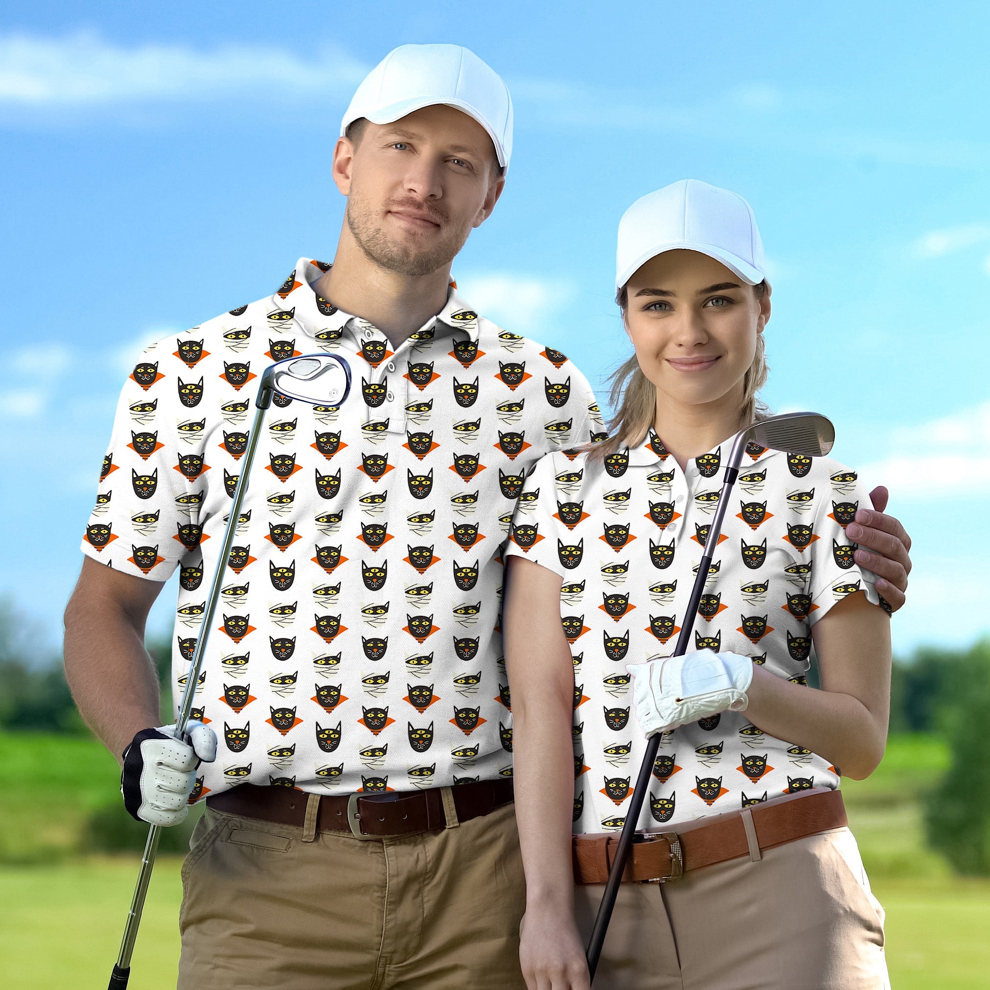 Couple wearing matching Halloween mummy cat golf shirts with white caps on golf course