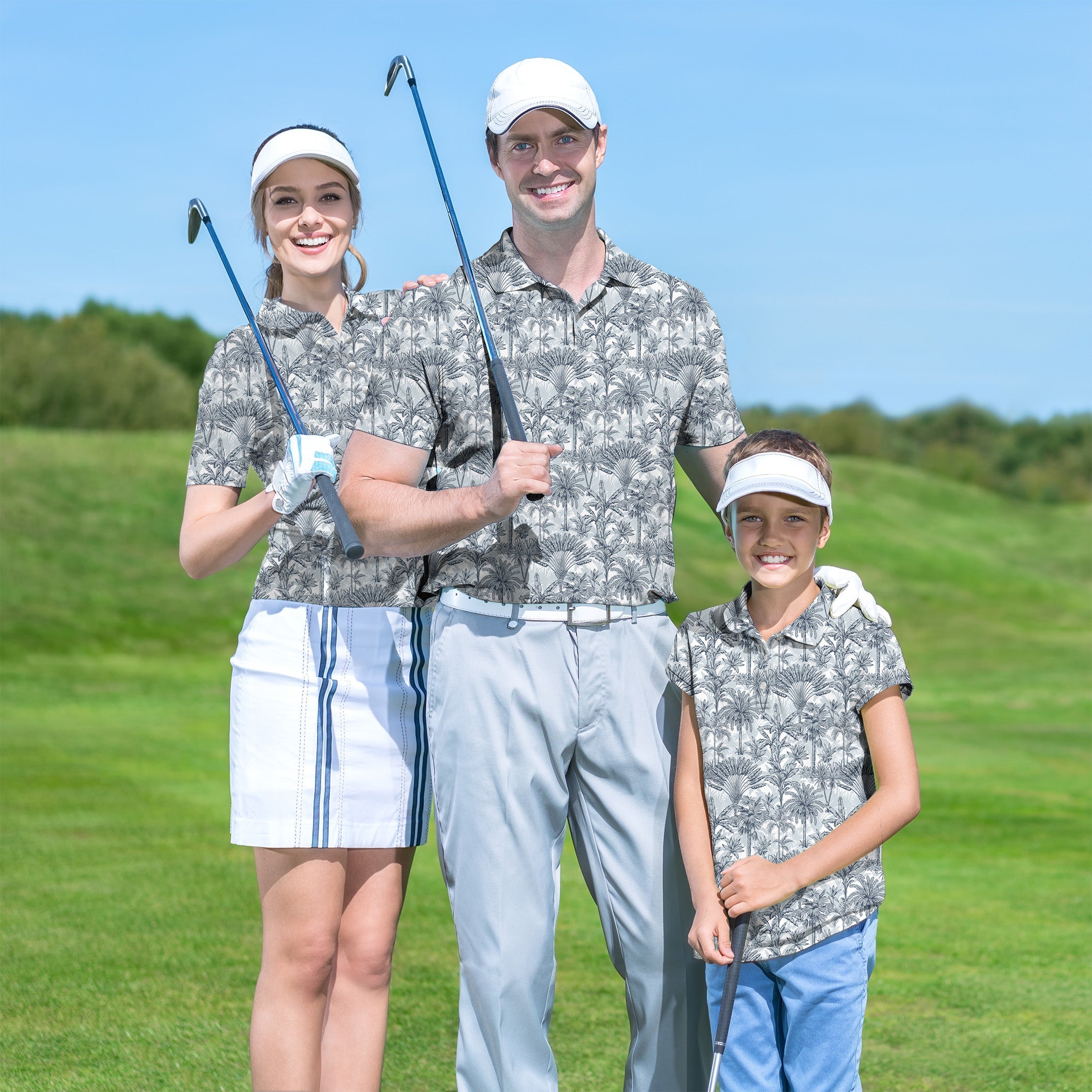 Family wearing customized Twilight Palms set golf apparel with palm tree pattern on a sunny golf course