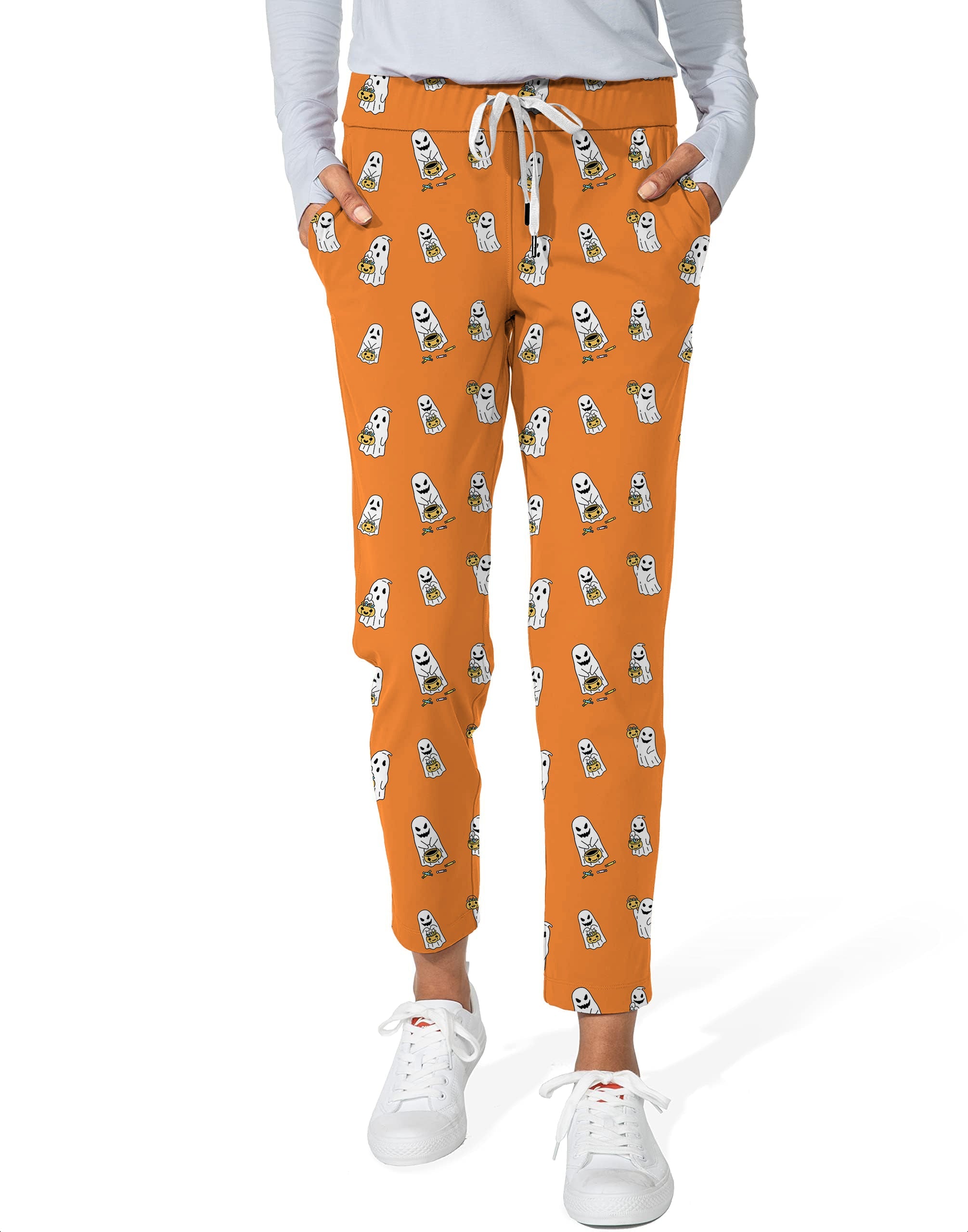 Women's orange 7/8 stretch ankle golf pants with Halloween ghost pumpkin basket pattern