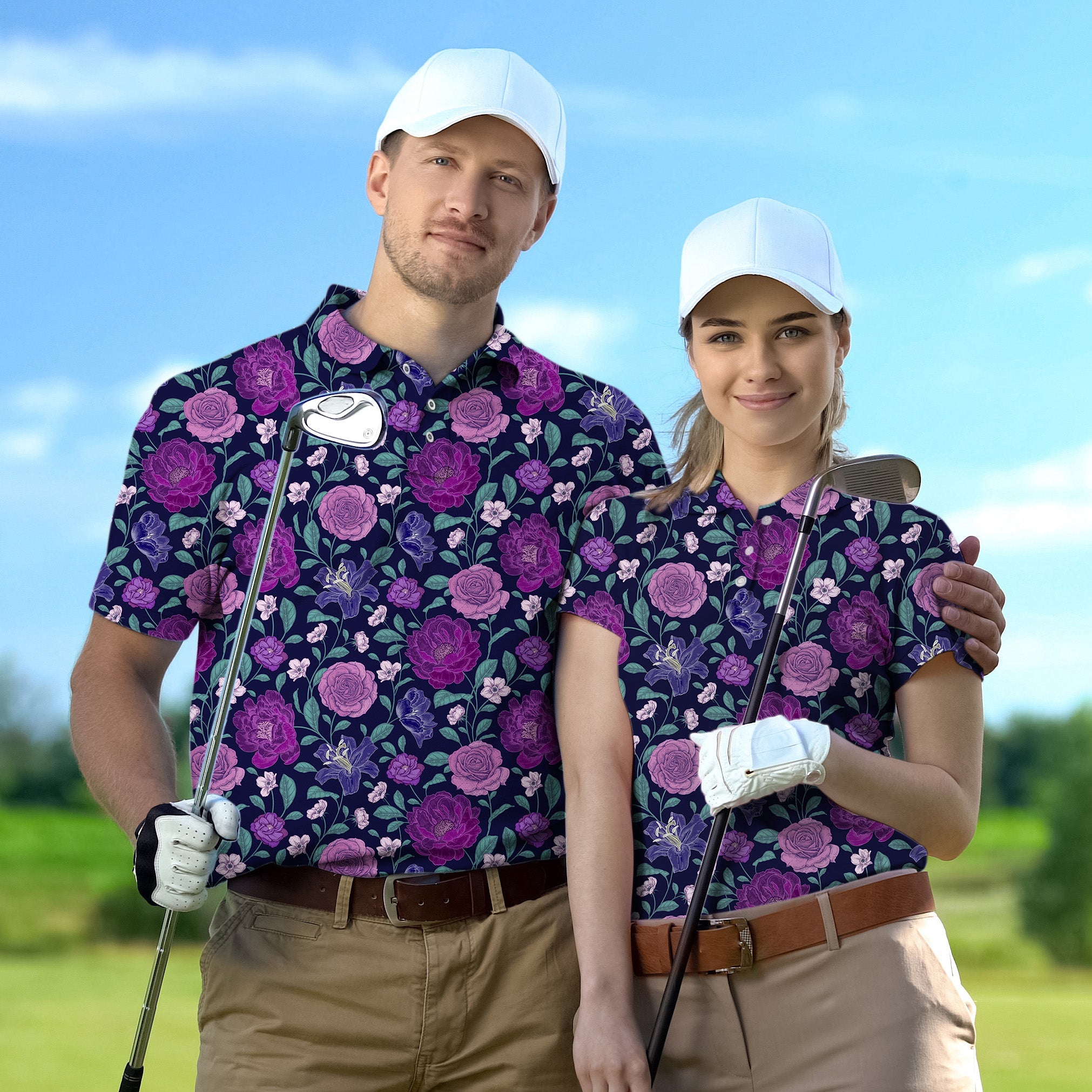 Couple wearing matching purple floral golf shirts with white caps on a golf course