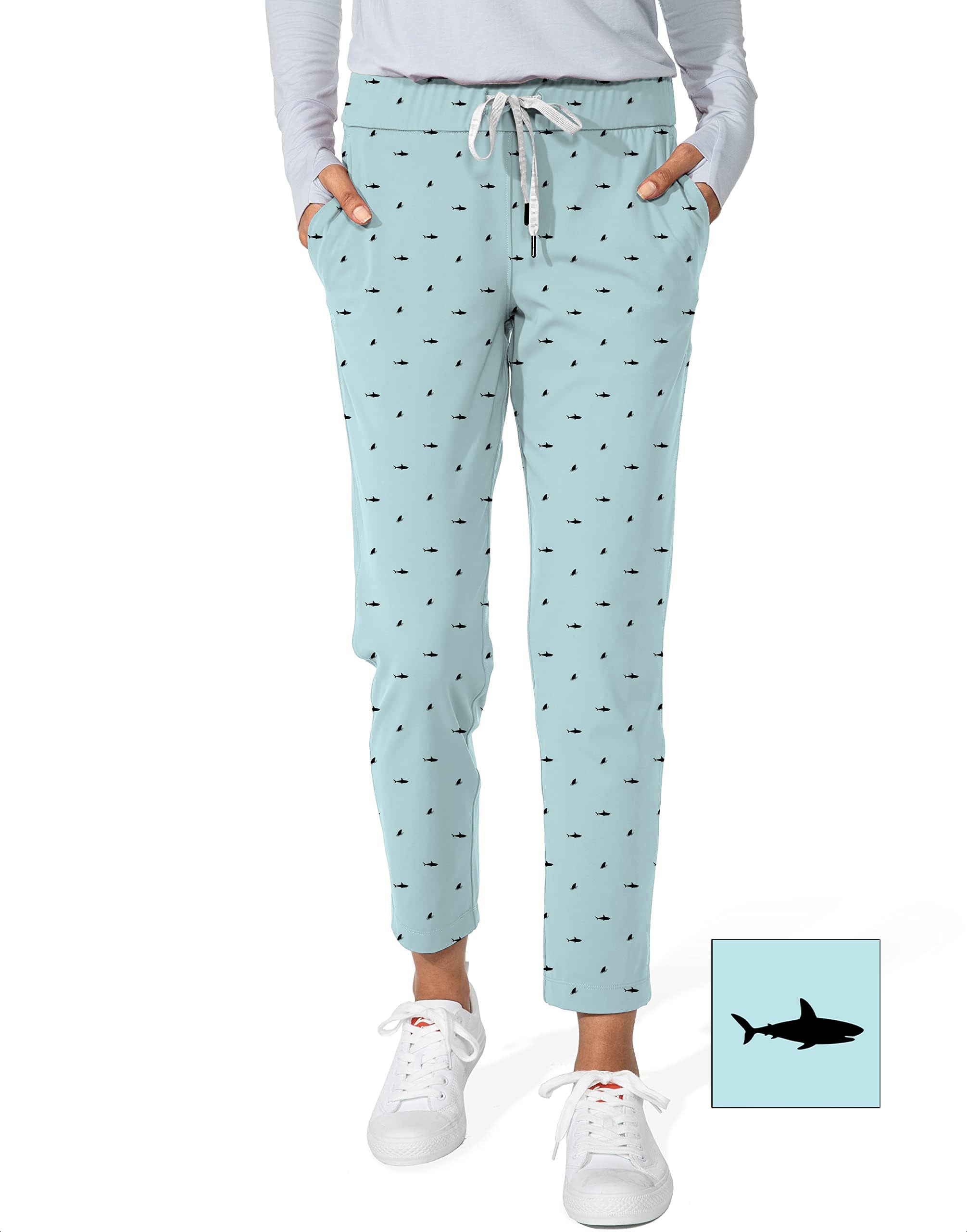 Women's 7/8 stretch ankle golf pants with black shark and fin pattern in light blue color