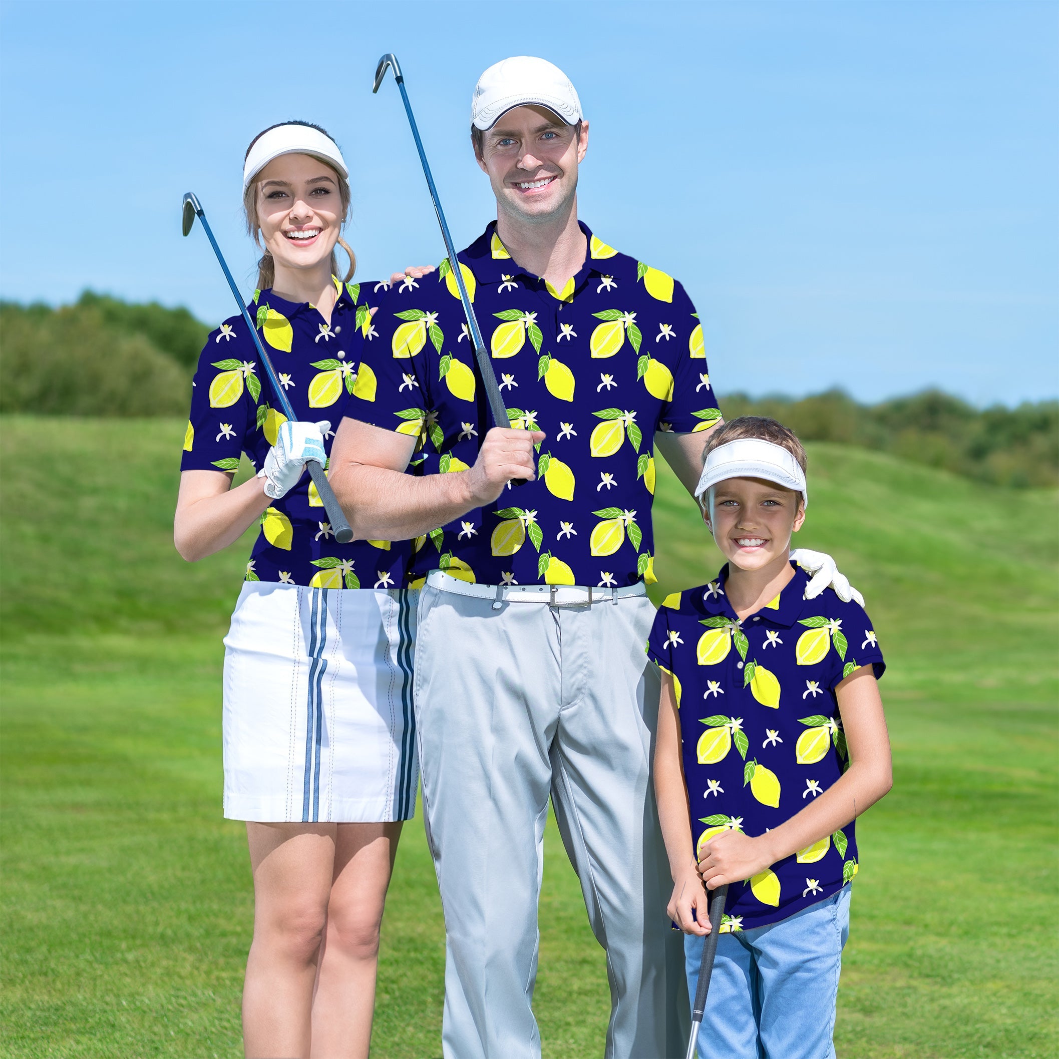 Family wearing zesty lemon set golf shirts on a green golf course with clubs