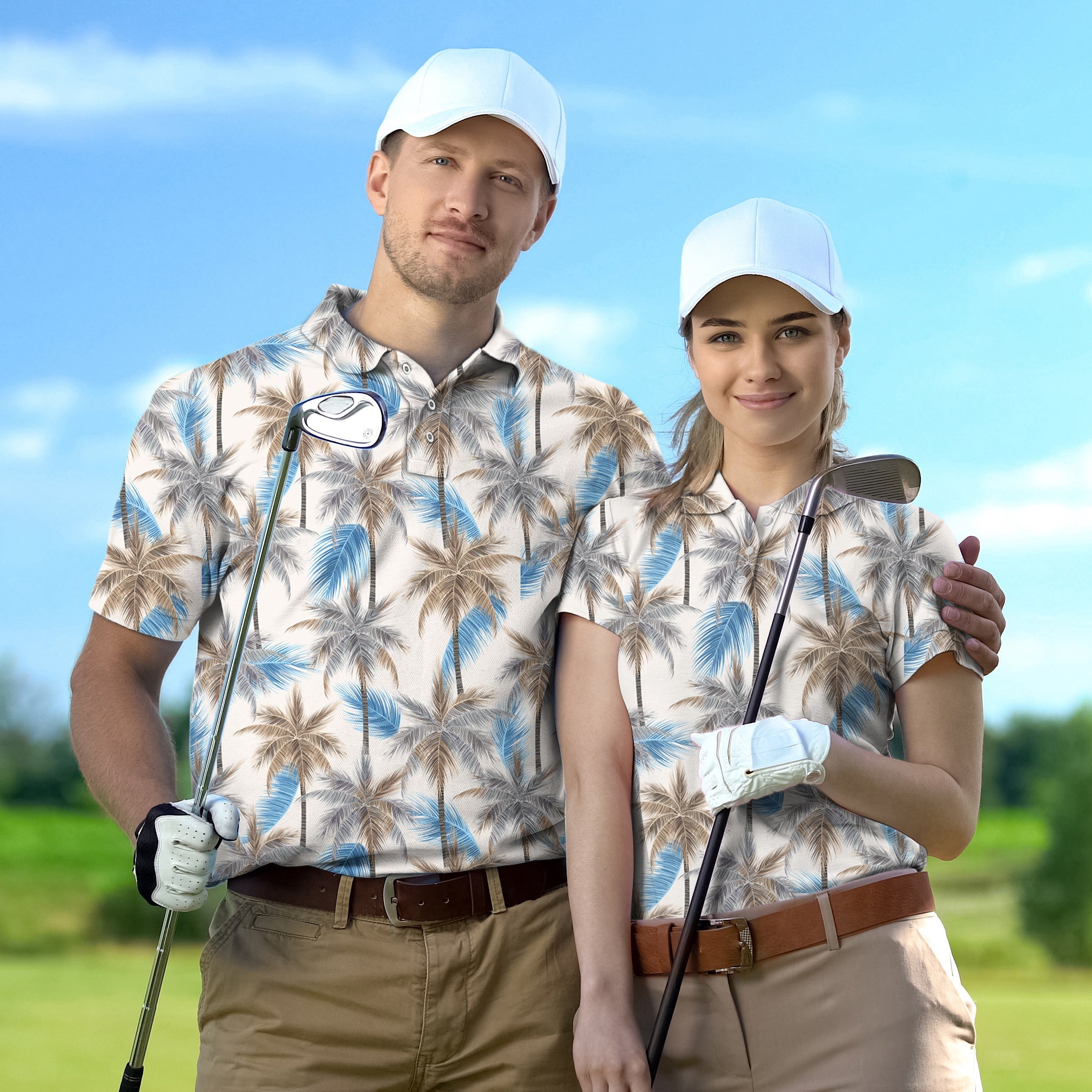 Couple wearing customized Palm Haven golf polos with palm tree print on a golf course