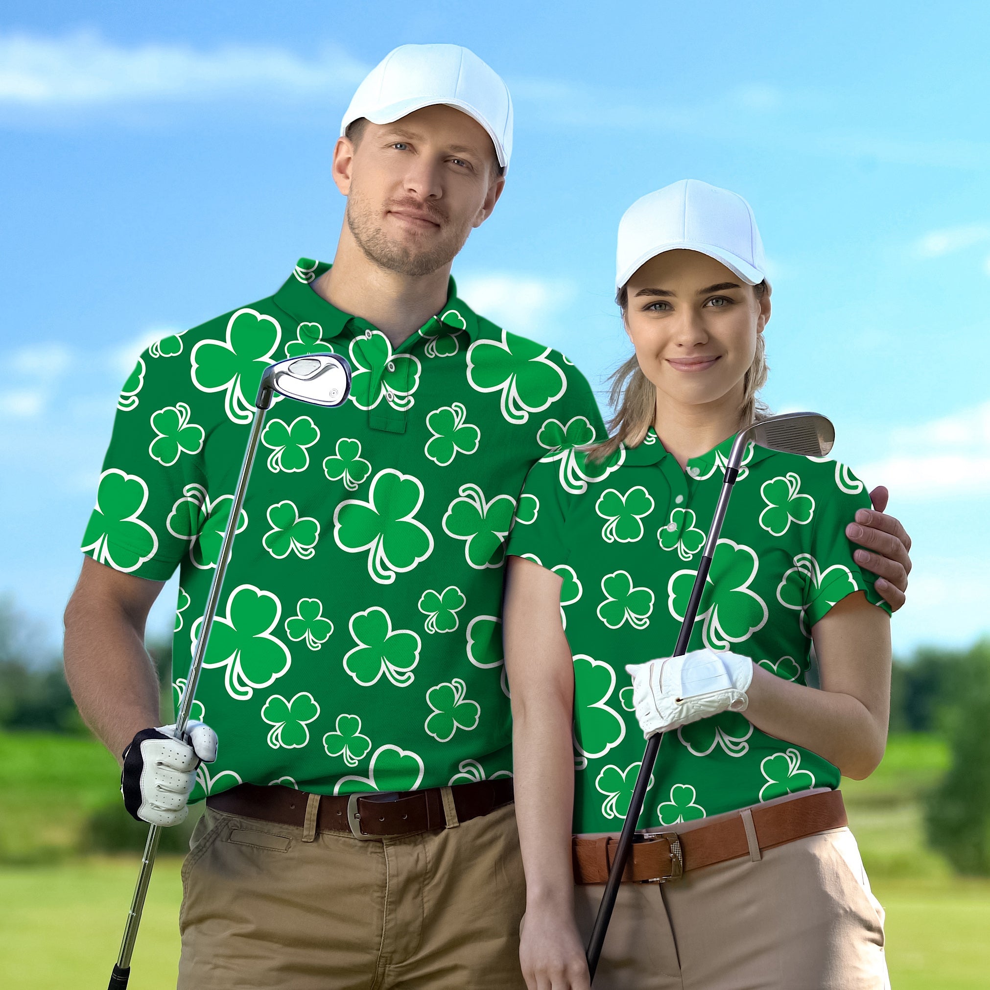 Couple wearing green leaf clover patterned St. Patrick's Day golf shirts holding clubs on golf course