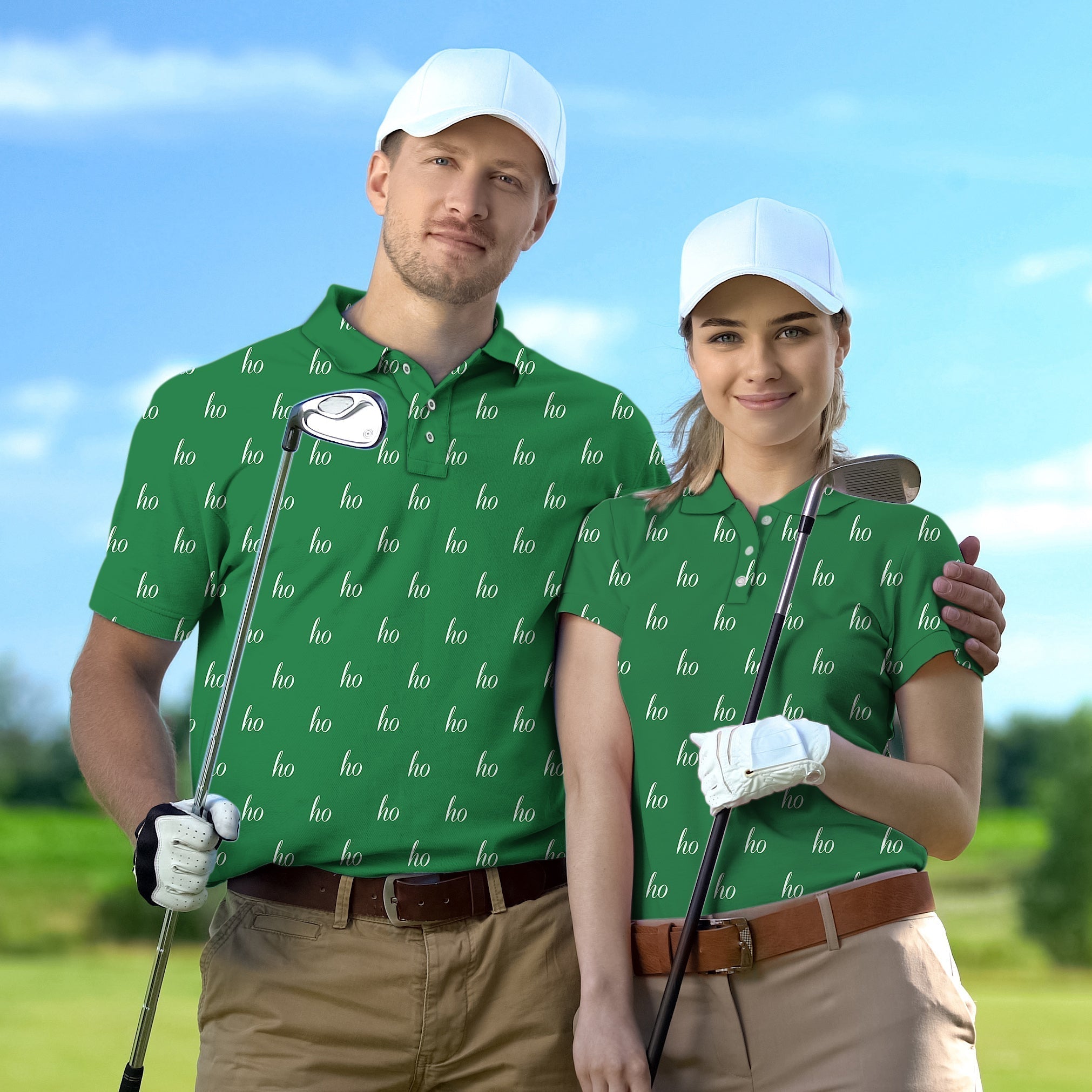 Couple wearing green custom name golf shirts holding clubs on golf course