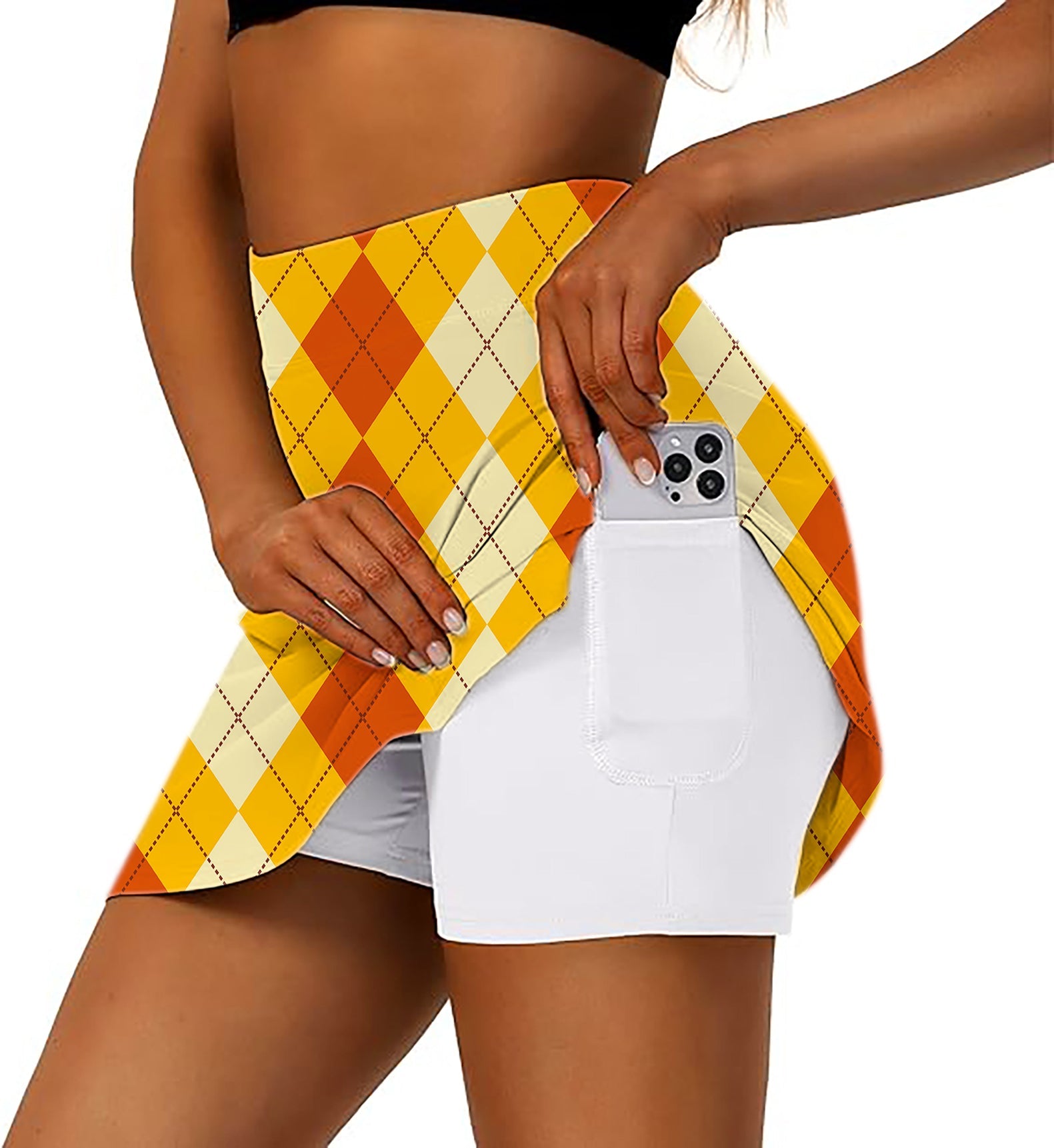 Women's Halloween light yellow red argyle golf skirt with inner shorts and side pocket holding phone
