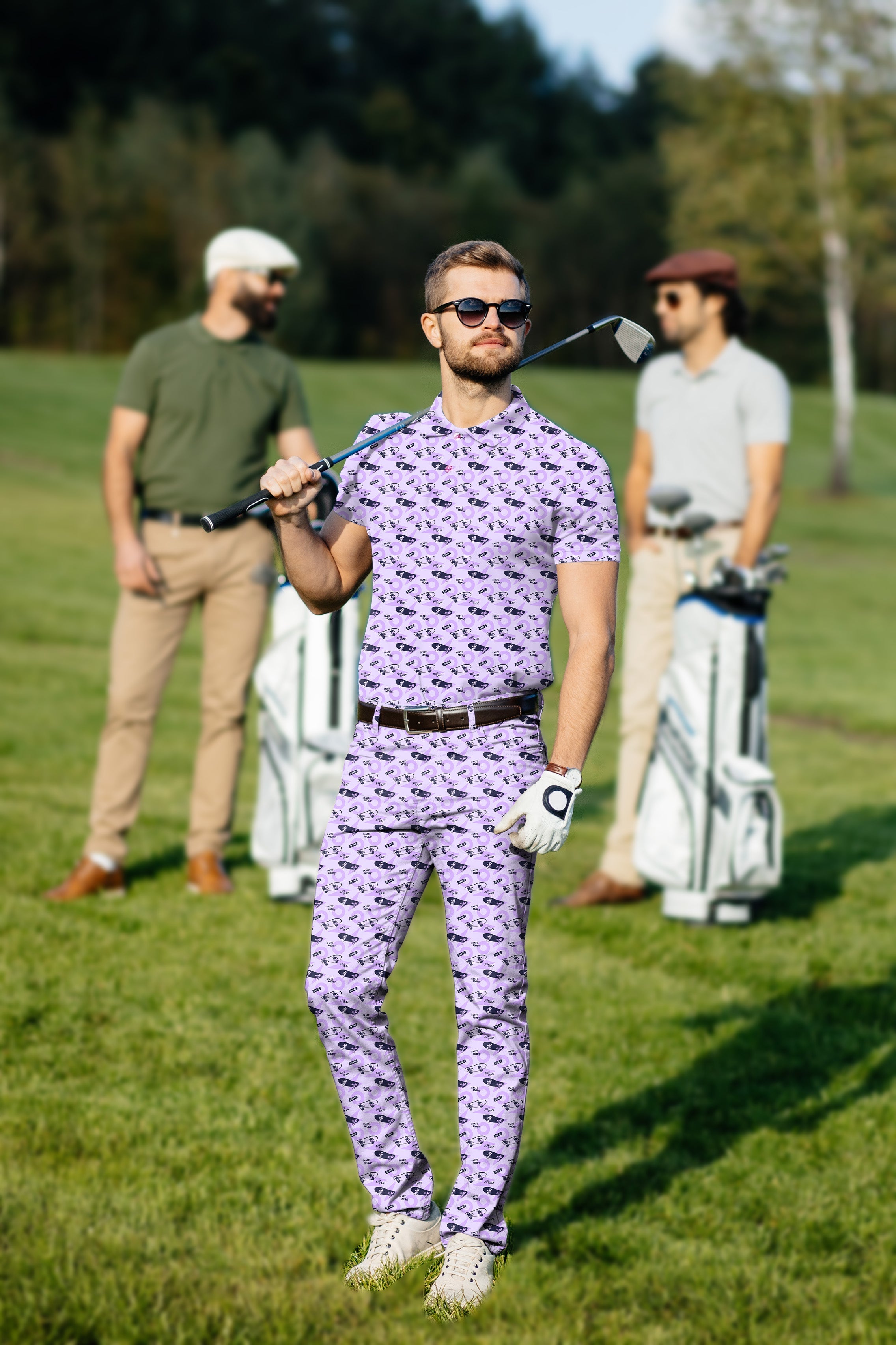 Men's golf set with purple patterned polo and pants for stylish comfort and UV protection