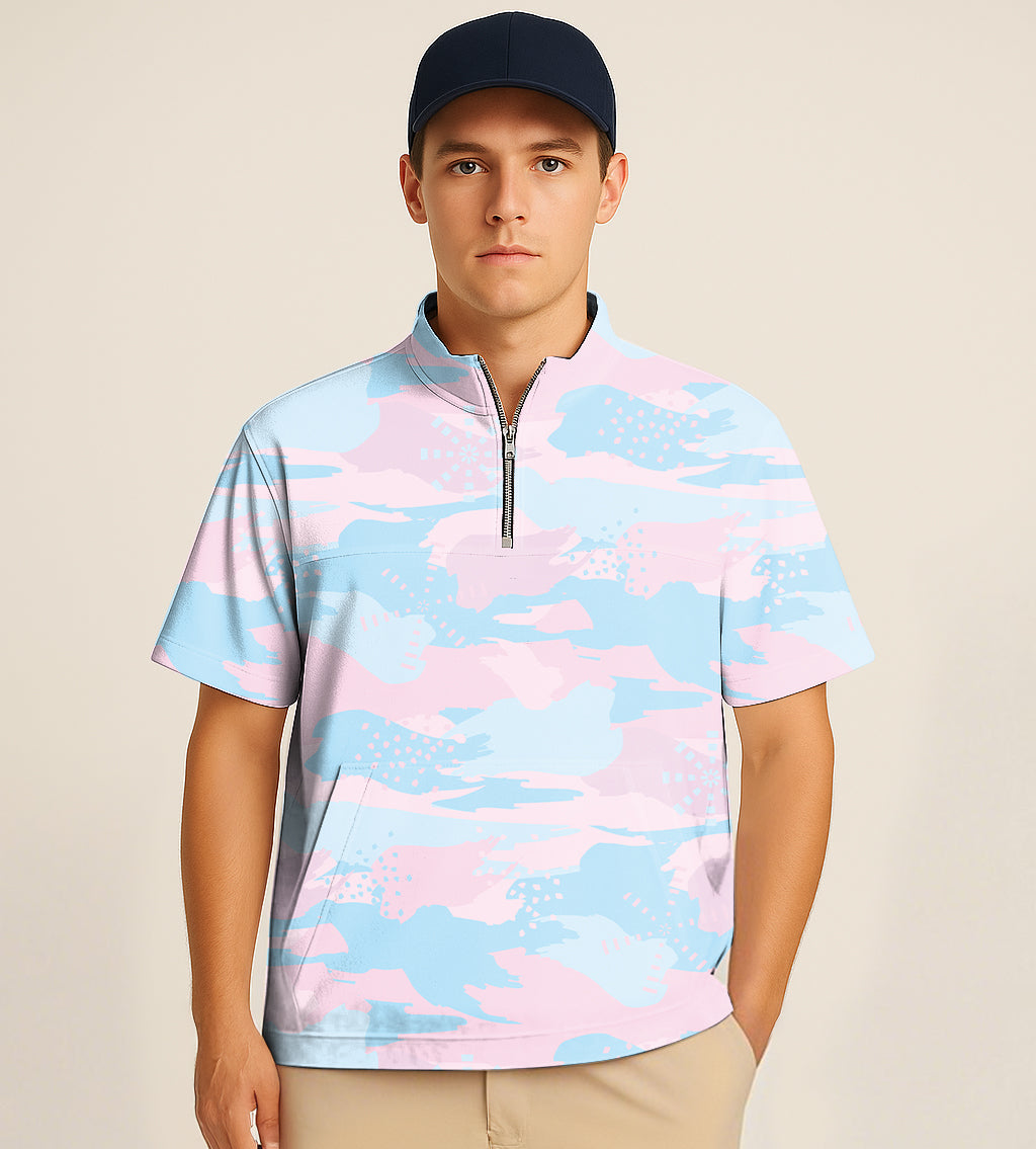 male model wearing half zipper turtleneck golf short sleeve shirt with pastel blue and pink camouflage pattern and navy cap