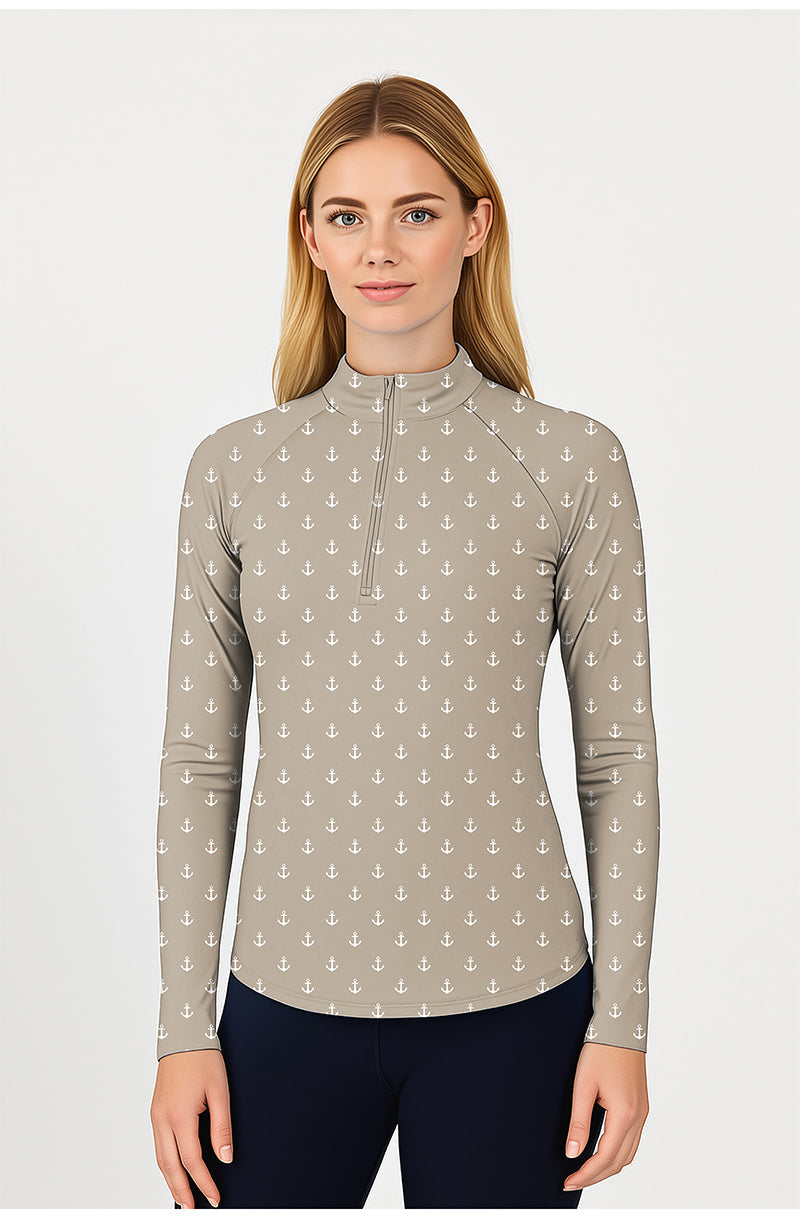 Beige anchor print women's golf 3/4 zip top with long sleeves and mock collar