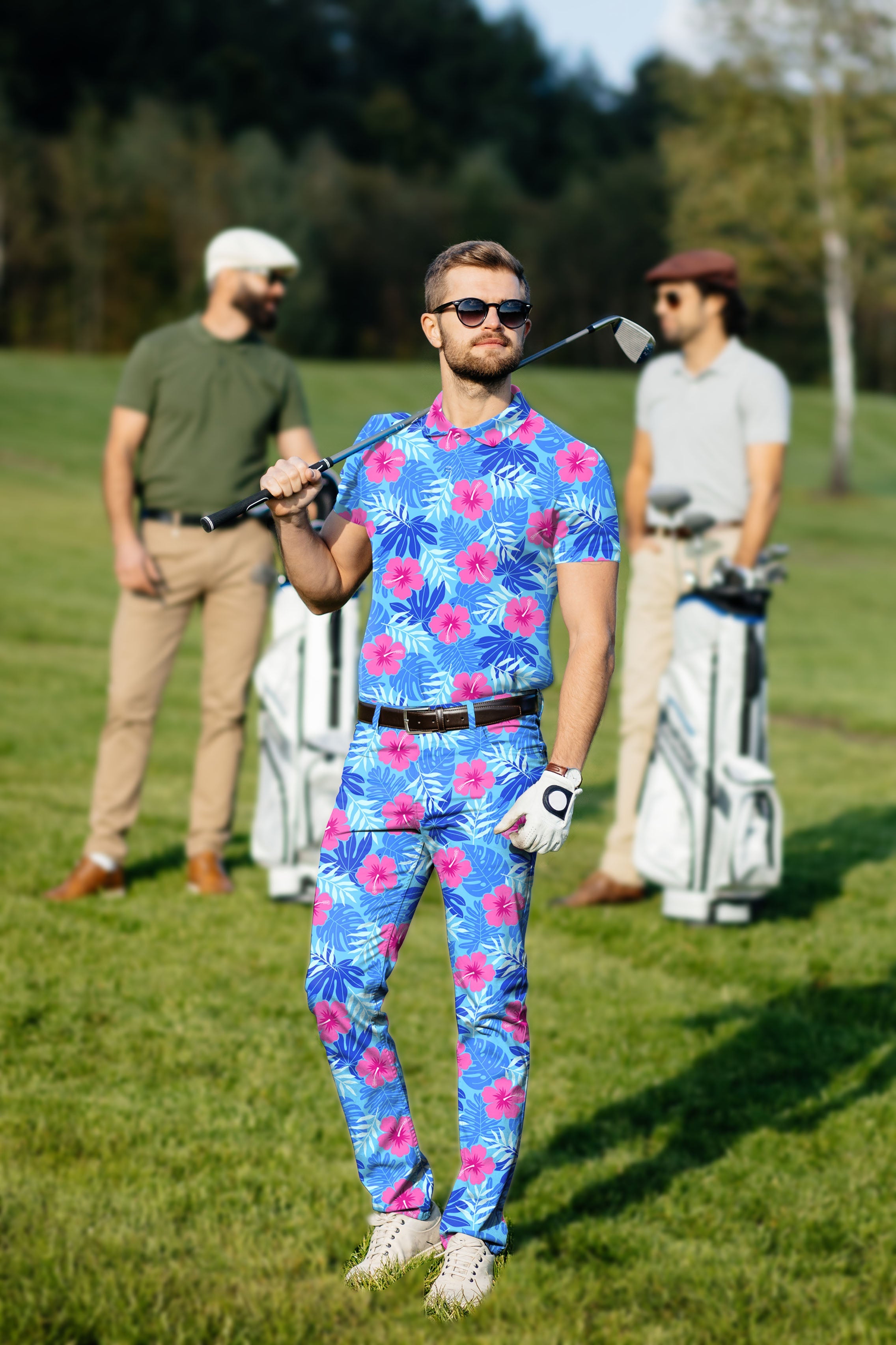 Men's golf set with vivid bloom floral polo and pants on golfer at course