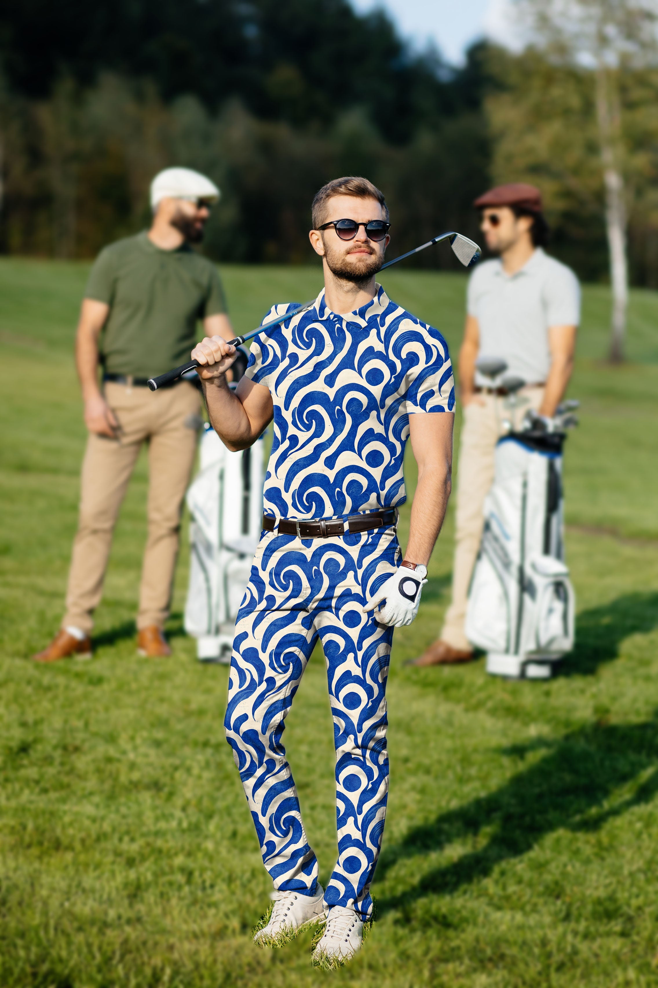 Men's golf set polo and pants in blue harmony pattern worn by golfer on course