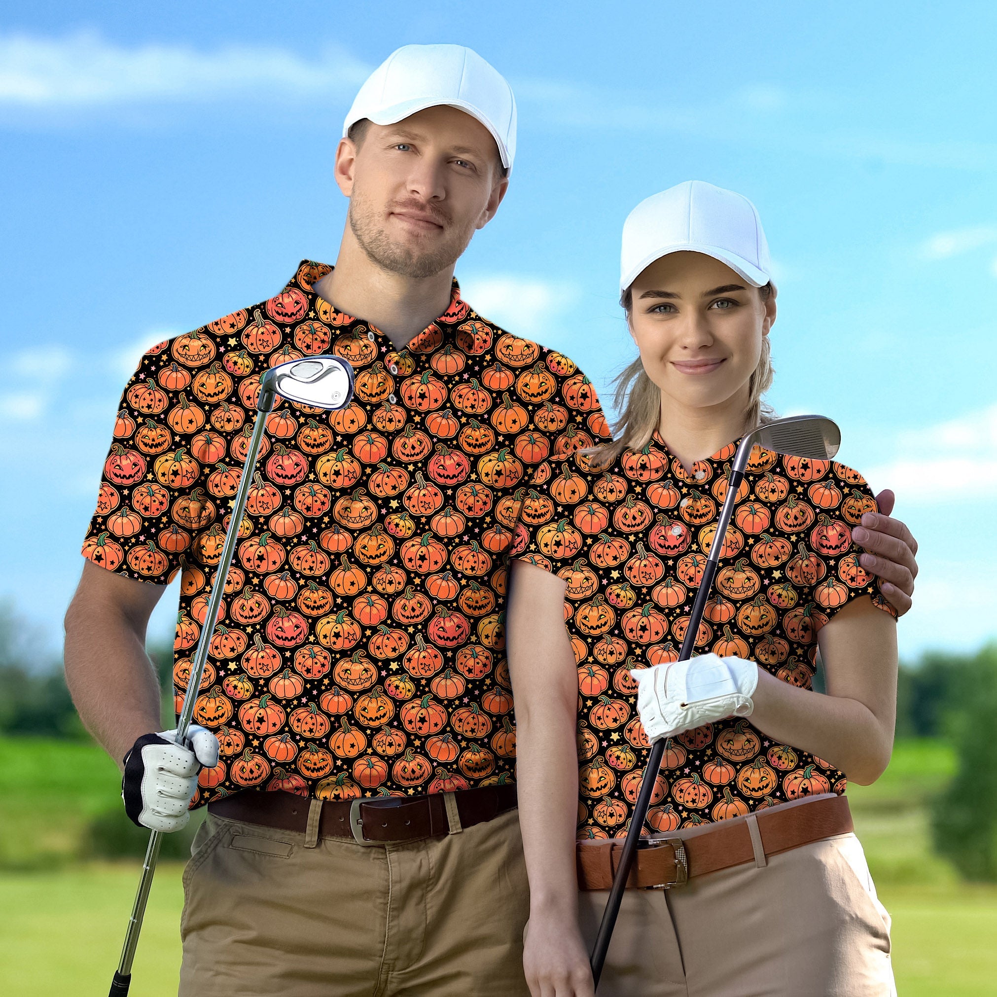Couple wearing Halloween star pumpkin golf shirts holding clubs outdoors