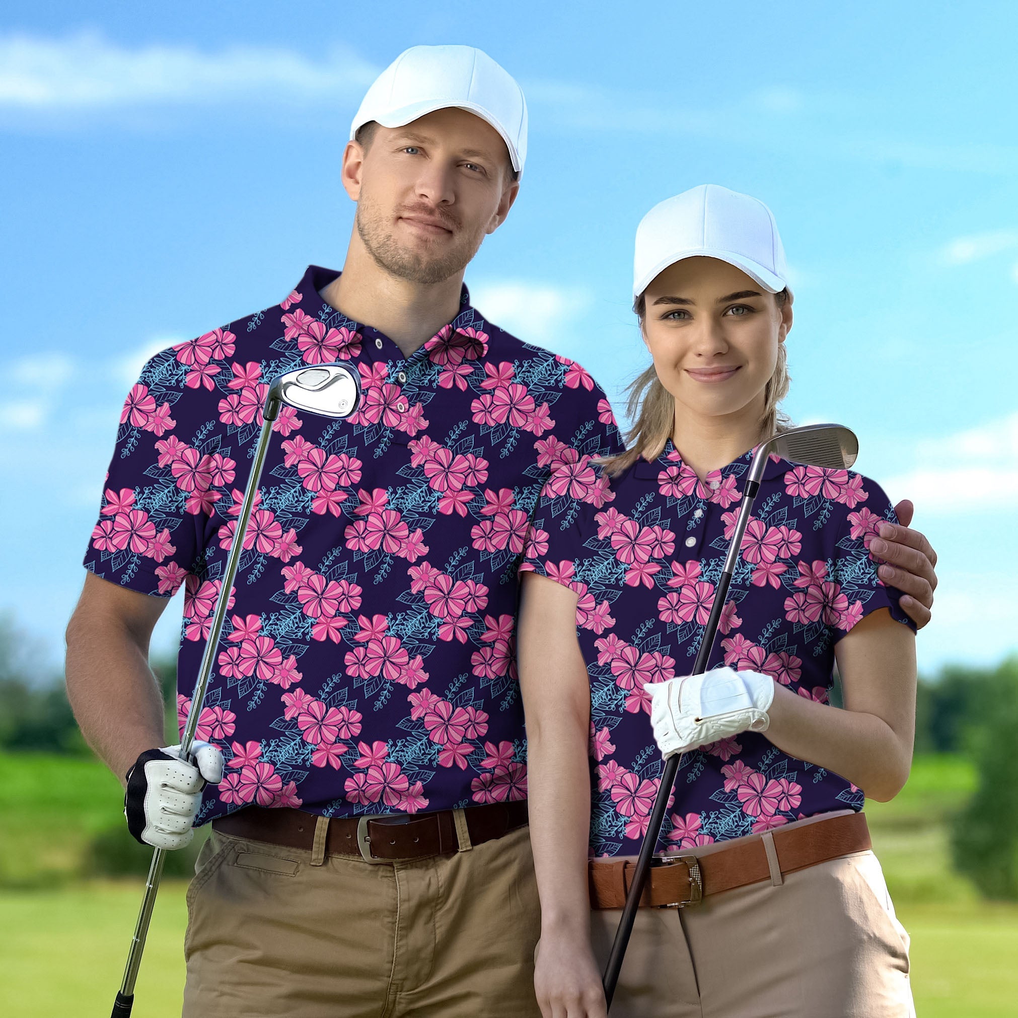 Couple wearing matching floral golf polo shirts with white caps on golf course