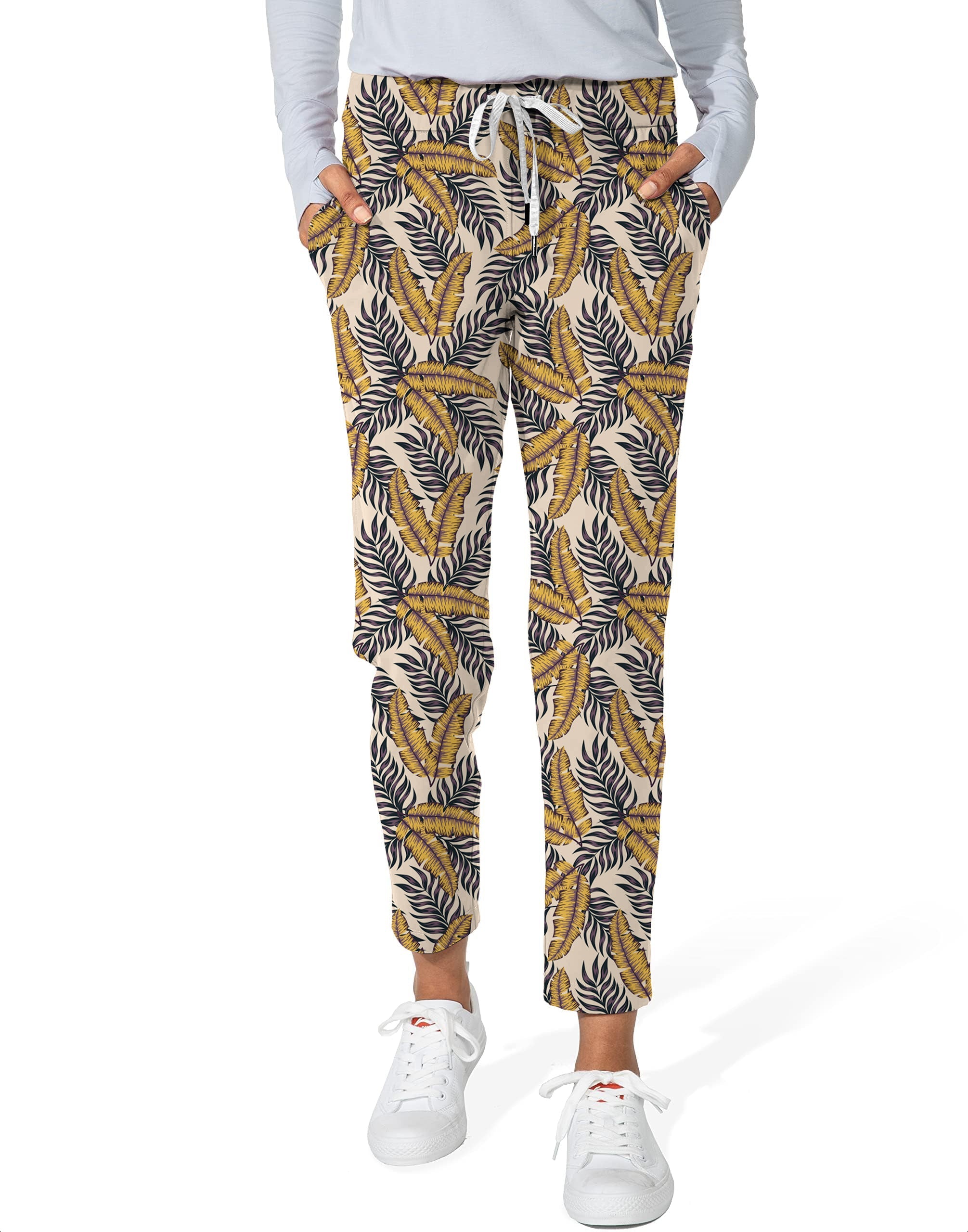 Golden Tropics-Women's 7/8 stretch ankle golf pants with tropical leaf pattern
