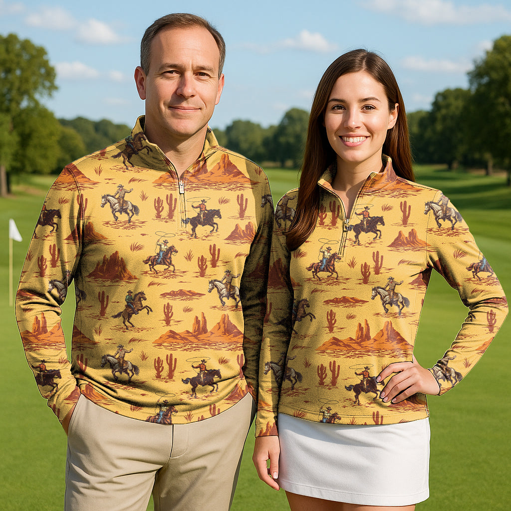 West Cowboy couple wearing matching 3/4 zip golf tops with cowboy print on a golf course