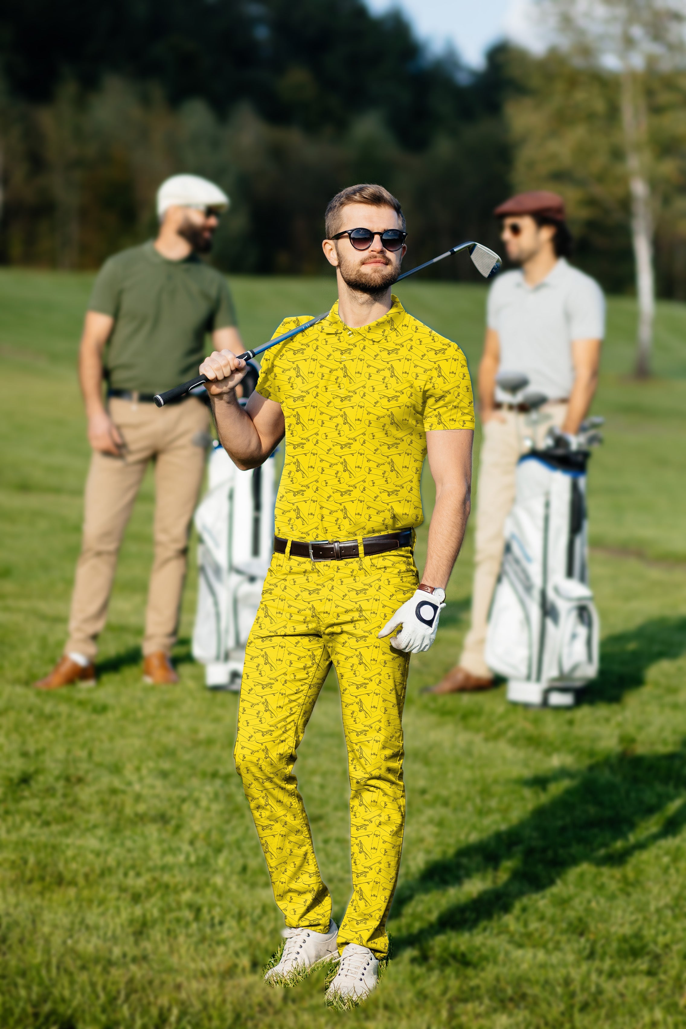 Men's golf set yellow polo and pants with four-way stretch and moisture-wicking fabric on golf course