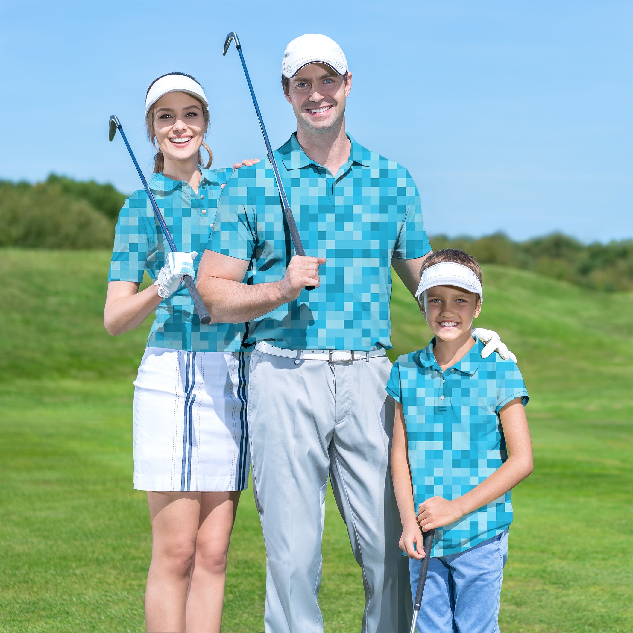 Family wearing blue pixel pattern golf shirts on green golf course with golf clubs