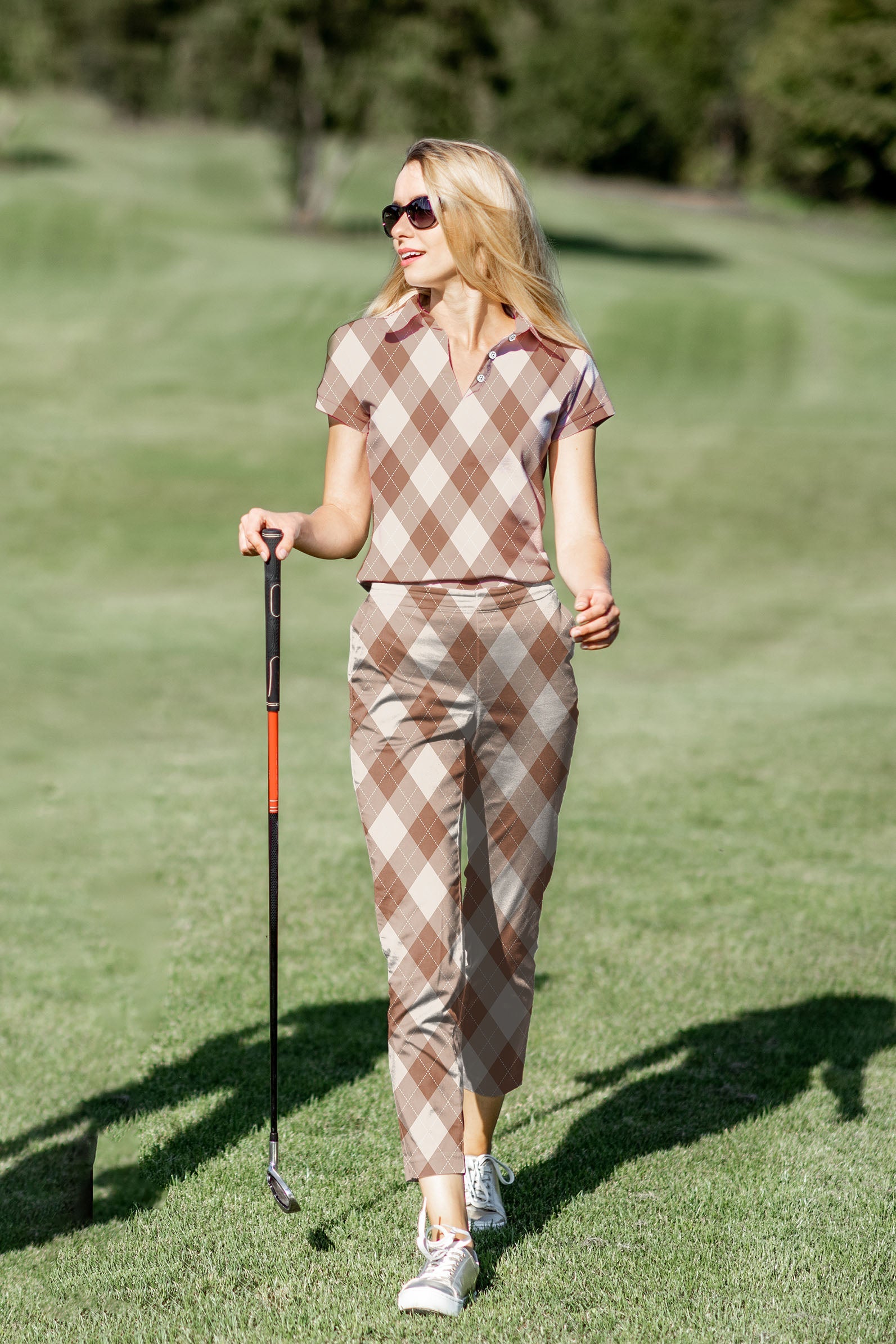 Women's brown argyle golf polo and pants set with four-way stretch and UPF 40+ protection