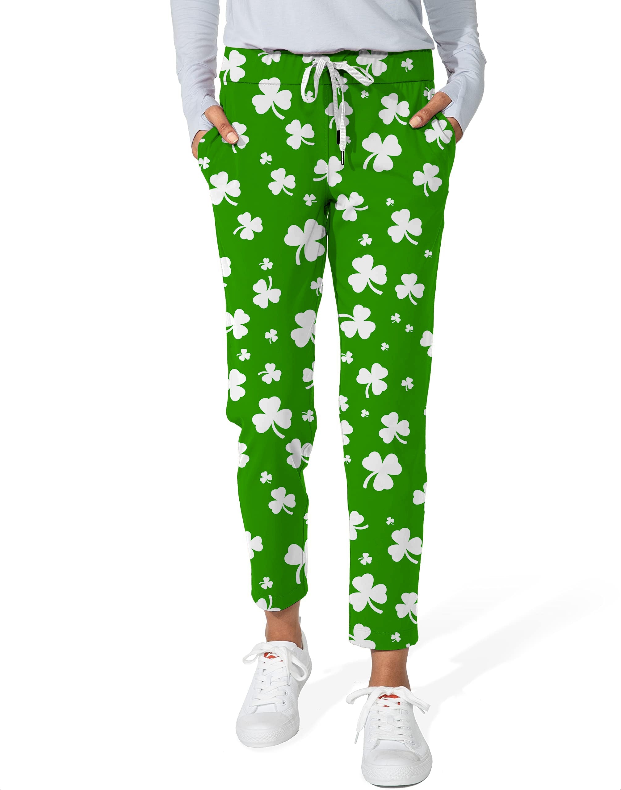 Women's green 7/8 stretch ankle golf pants with white leaf clover pattern for St. Patrick's Day