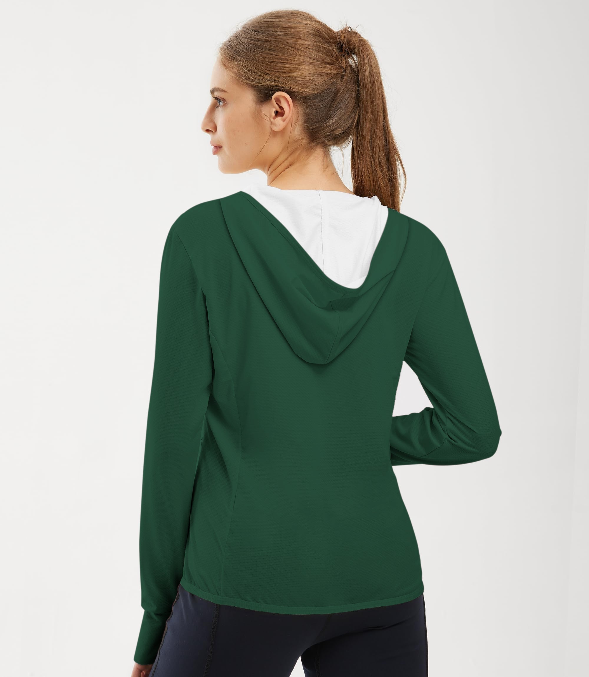 Women's green slim fit zip hoodie with white hood for outdoor golf and sun protection.