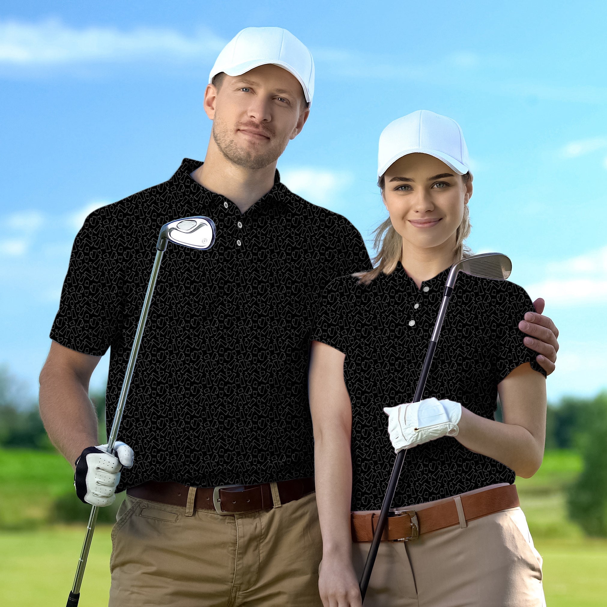 couple wearing matching black golf polos with white caps on golf course holding clubs golf polo couple set