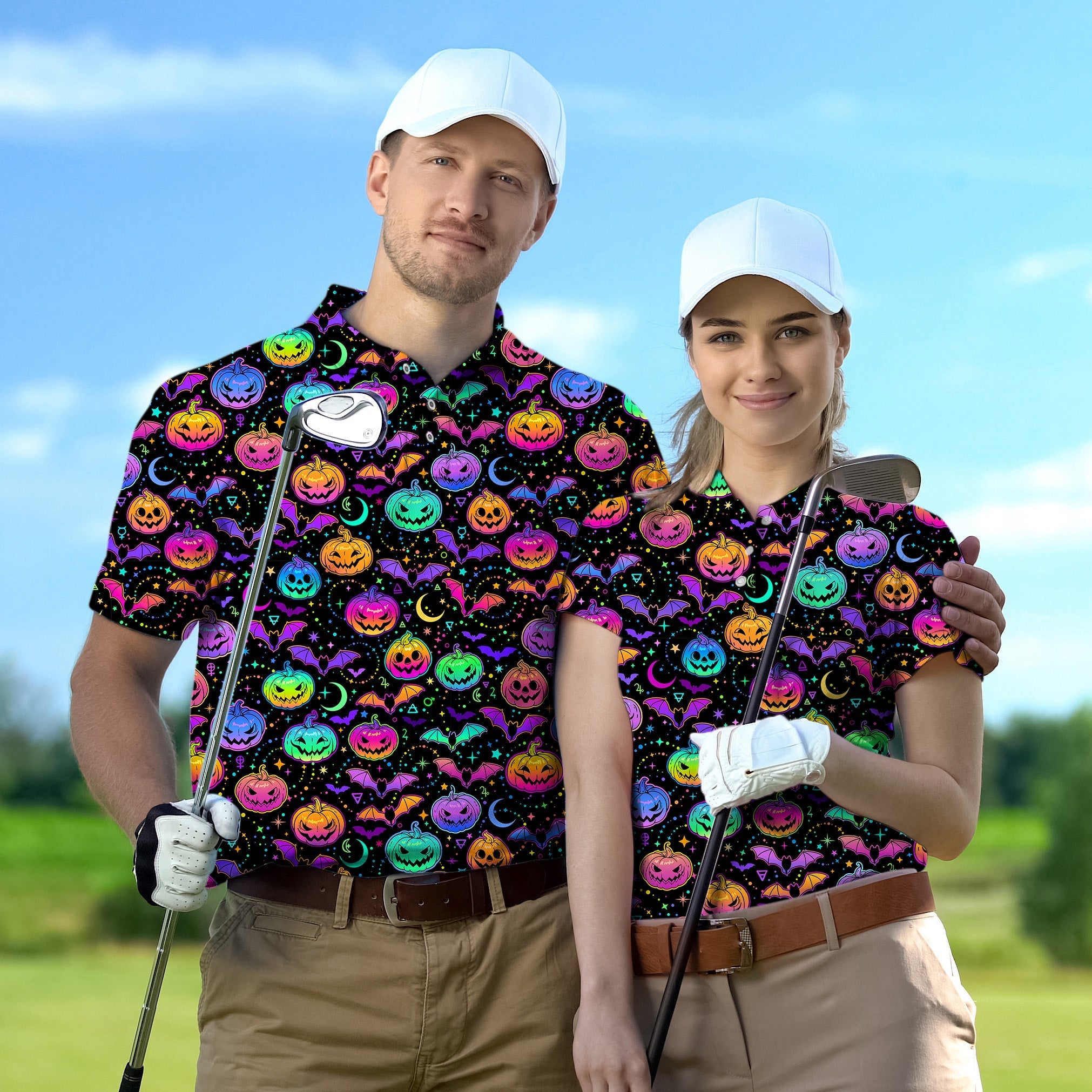 Couple wearing neon Halloween pumpkin golf shirts with white caps on golf course