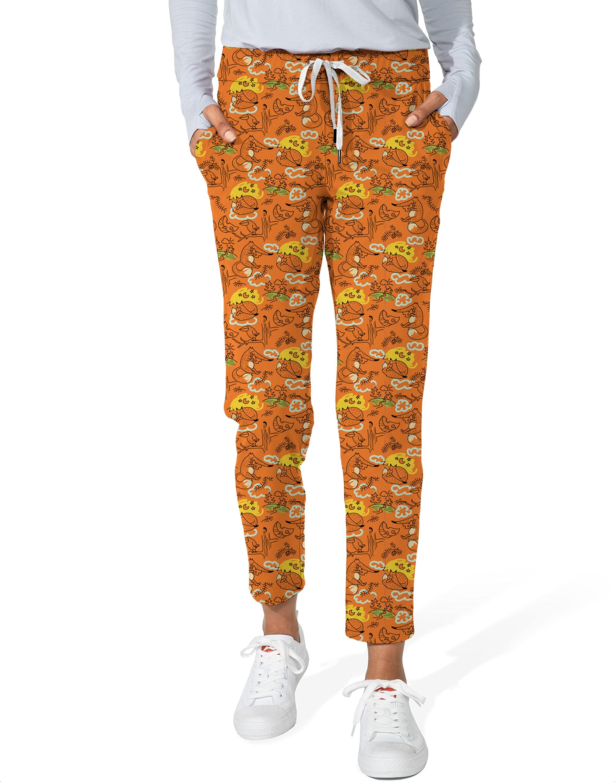Lazy Fox women's 7/8 stretch ankle golf pants in orange with drawstring waist and playful pattern