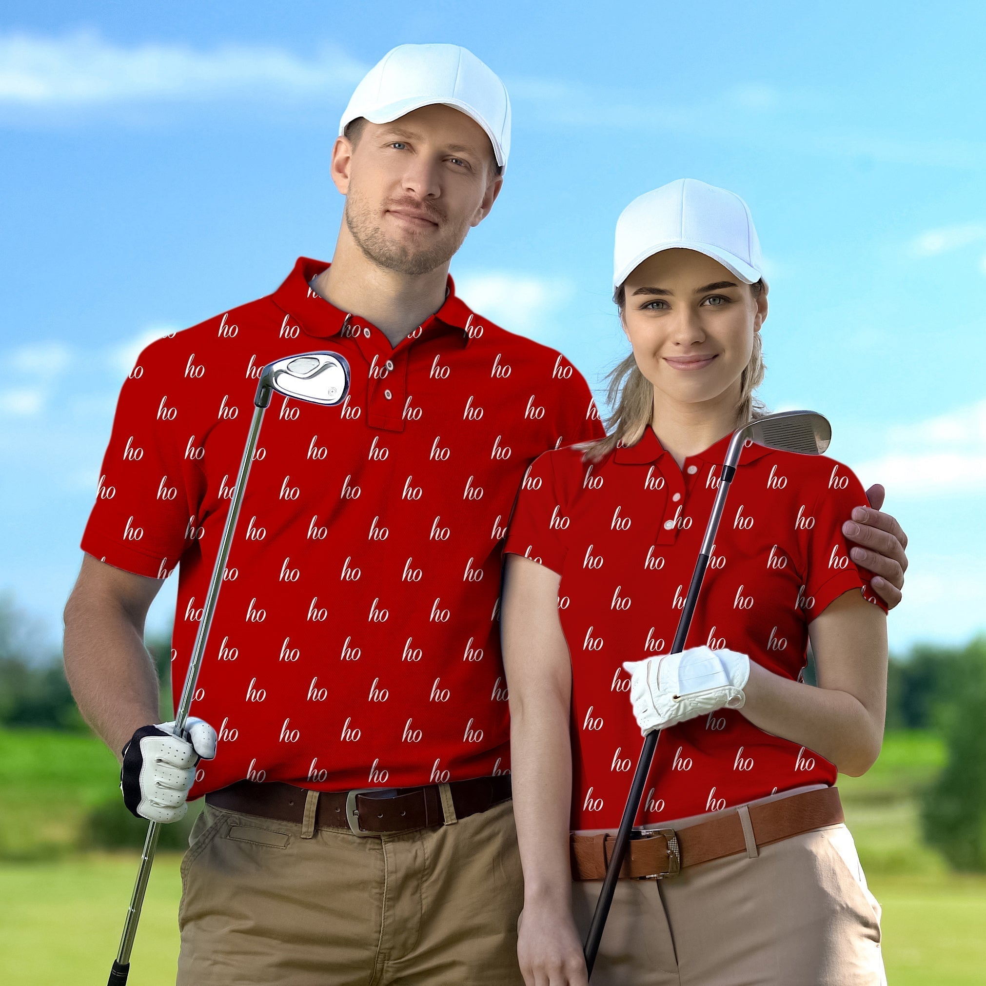 Couple wearing red custom name golf shirts holding clubs on golf course