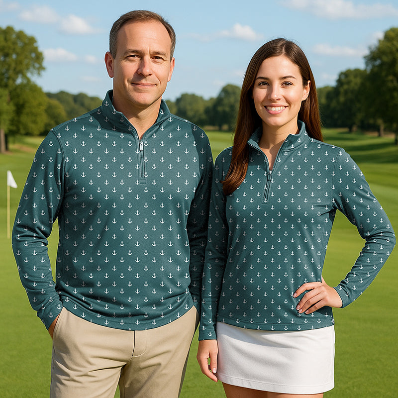 Couple wearing Lime Anchor Couple golf active 3/4 zip tops with anchor print on golf course