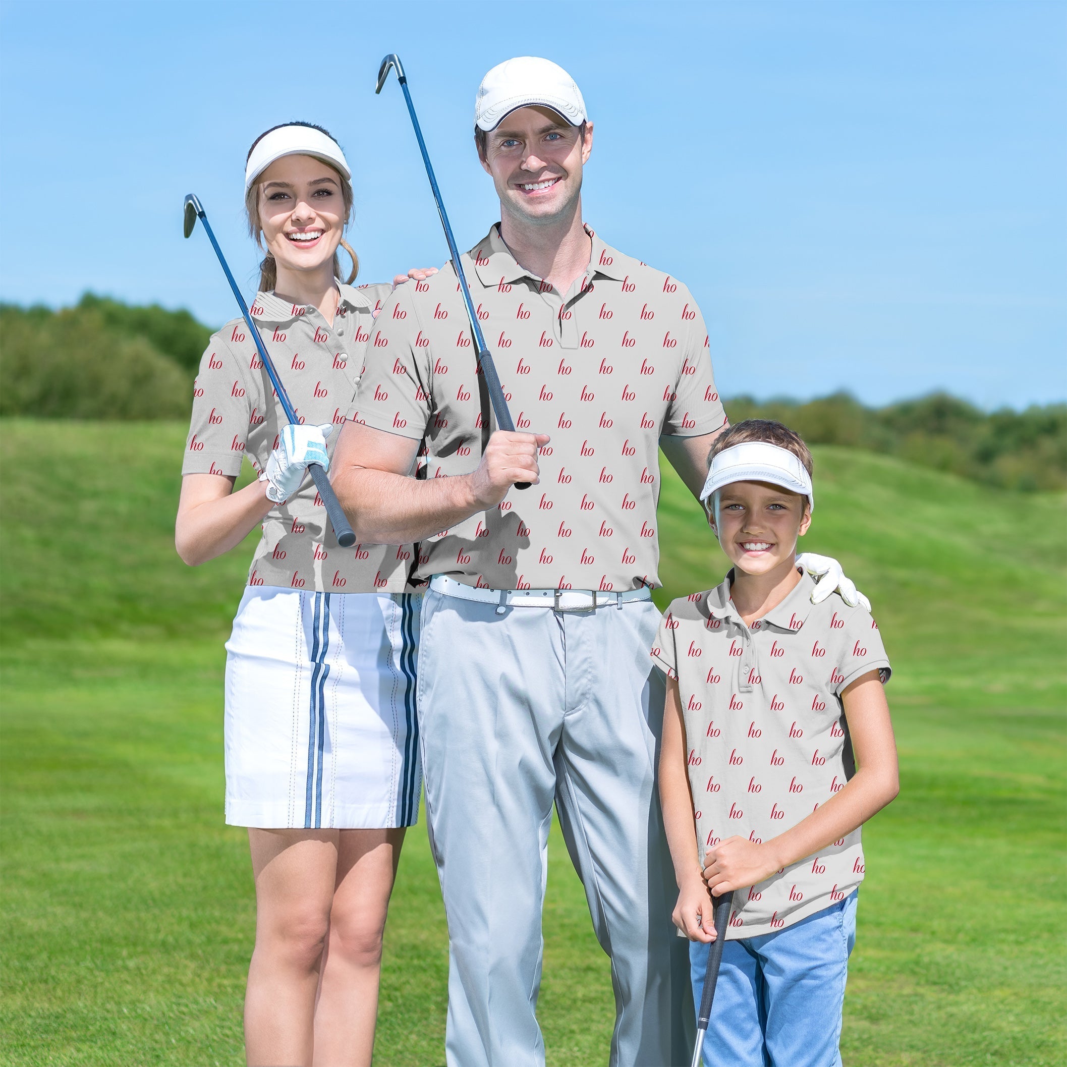 Family wearing grey custom name golf shirts on golf course with clubs
