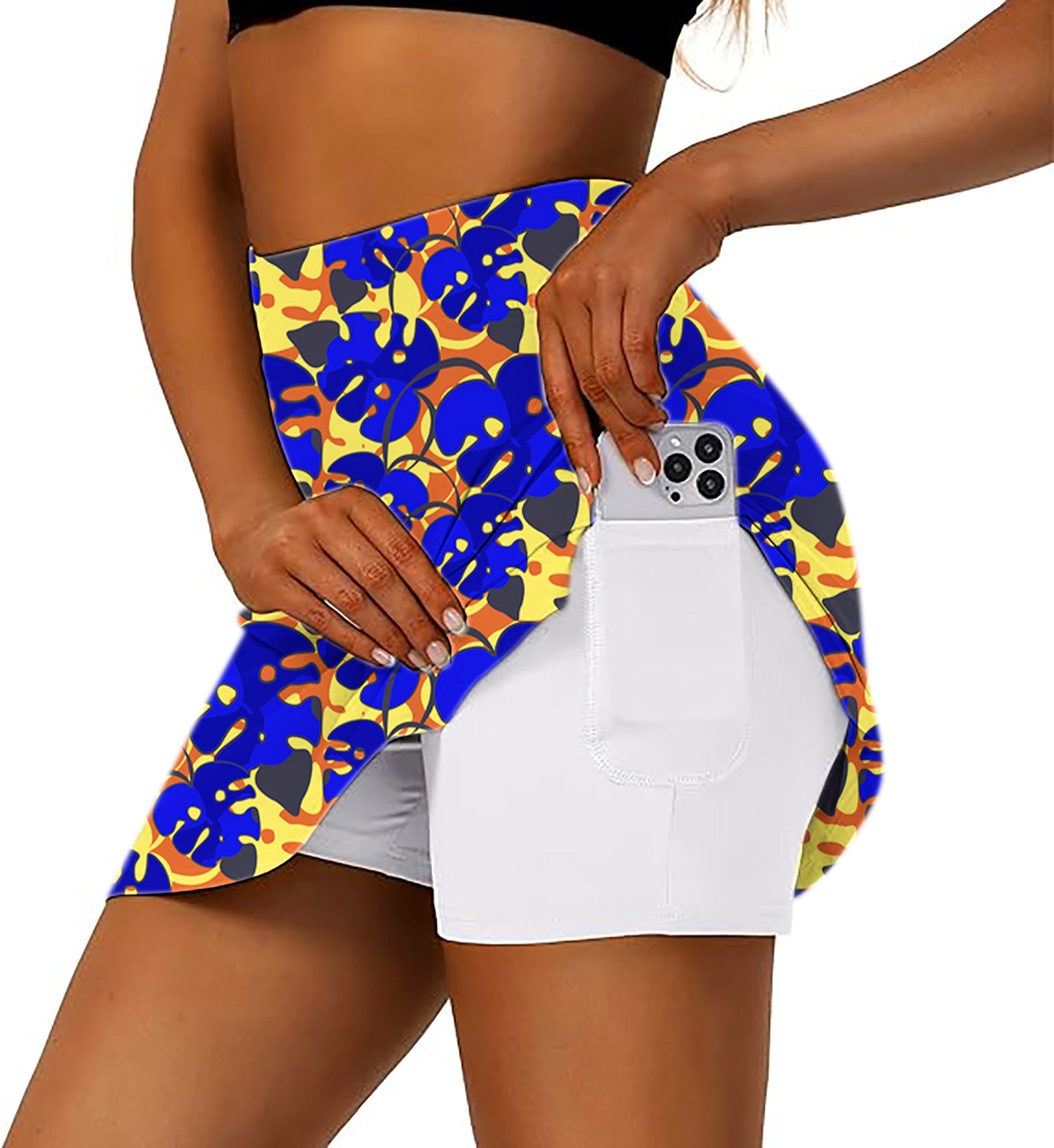 Women's athletic golf skort with tropical leaves print and side pocket for phone