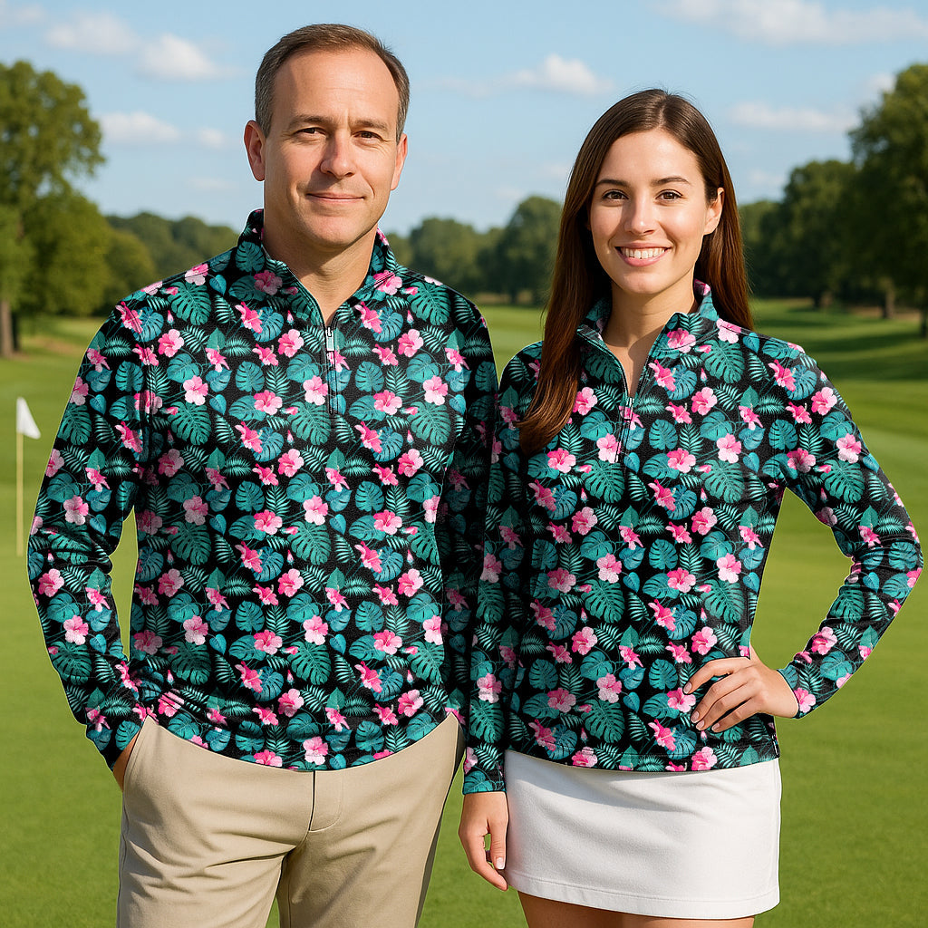 Couple wearing Tropic Floral 3/4 zip active tops with tropical floral print on golf course